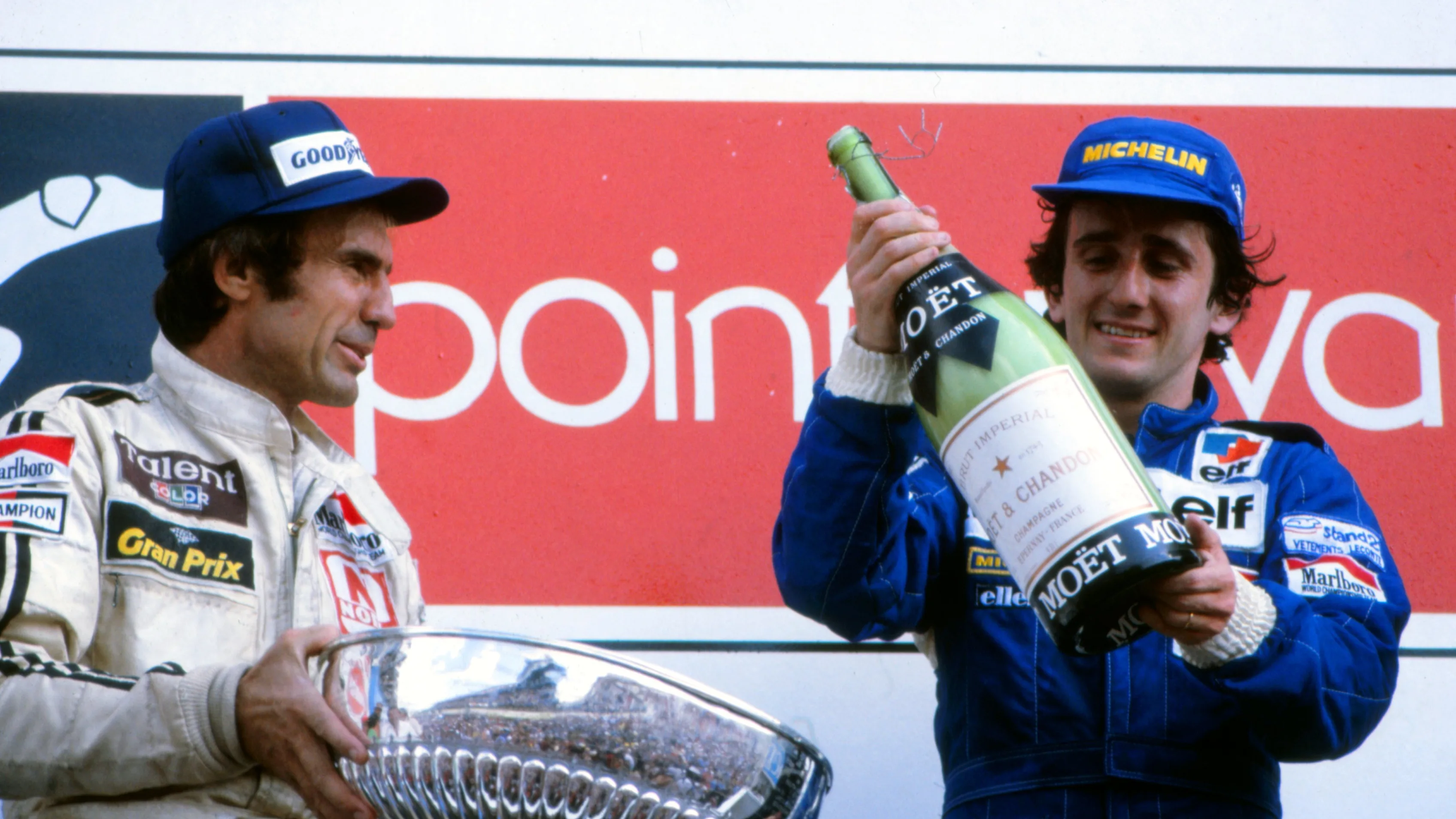 Podium and results: 1st Alain Prost (FRA), Renault, right. 2nd Carlos Reutemann (ARG), Williams,