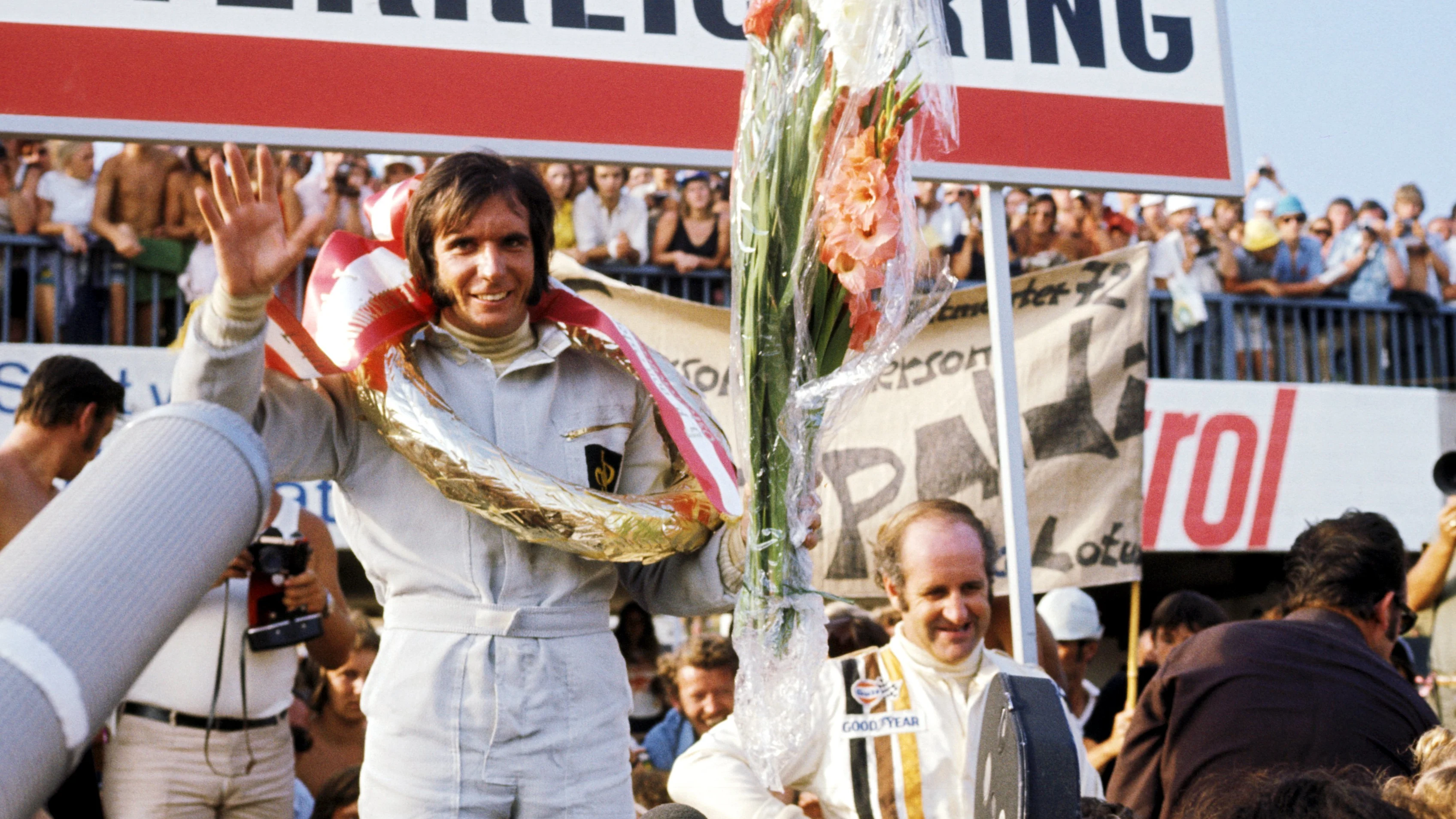 The podium (L to R): Emerson Fittipaldi (BRA) Lotus winner with second placed Denny Hulme (NZL)