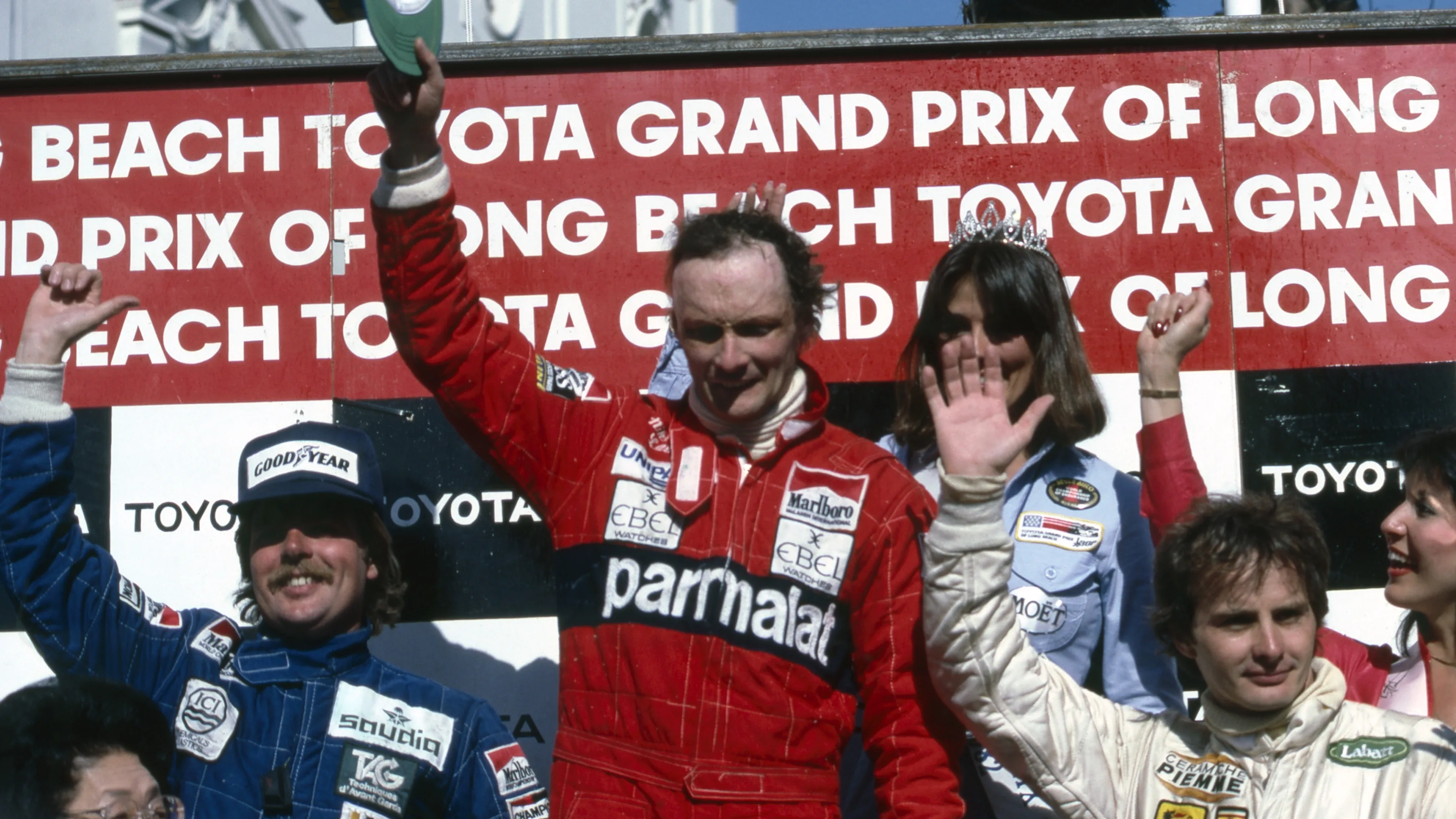 Podium and results: 1st Niki Lauda (AUT), McLaren, centre. 2nd Keke Rosberg (FIN), Williams, left.