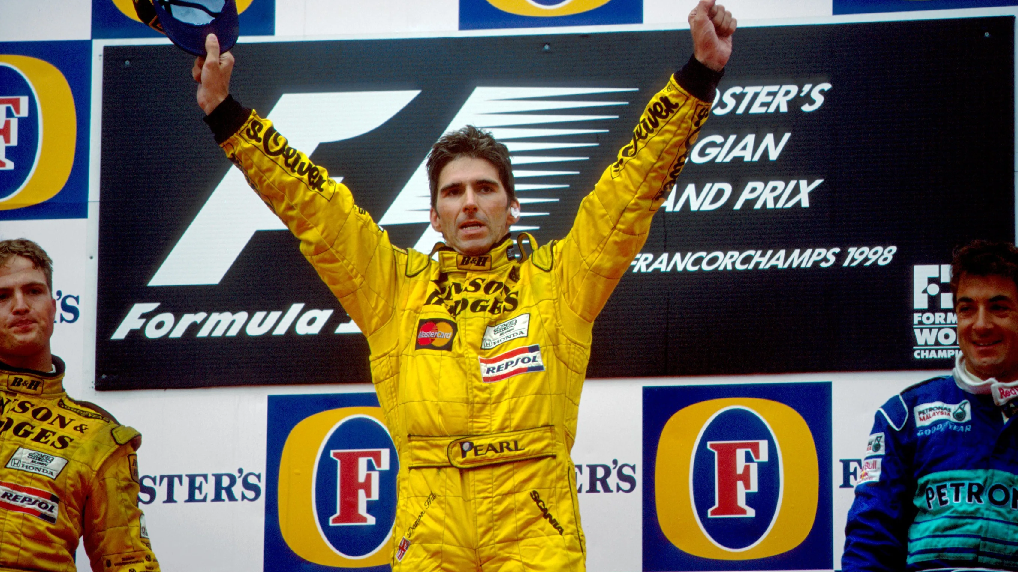 Podium and results: 1st: Damon Hill (GBR) Jordan, centre. 2nd: Ralf Schumacher (GER) Jordan, left.