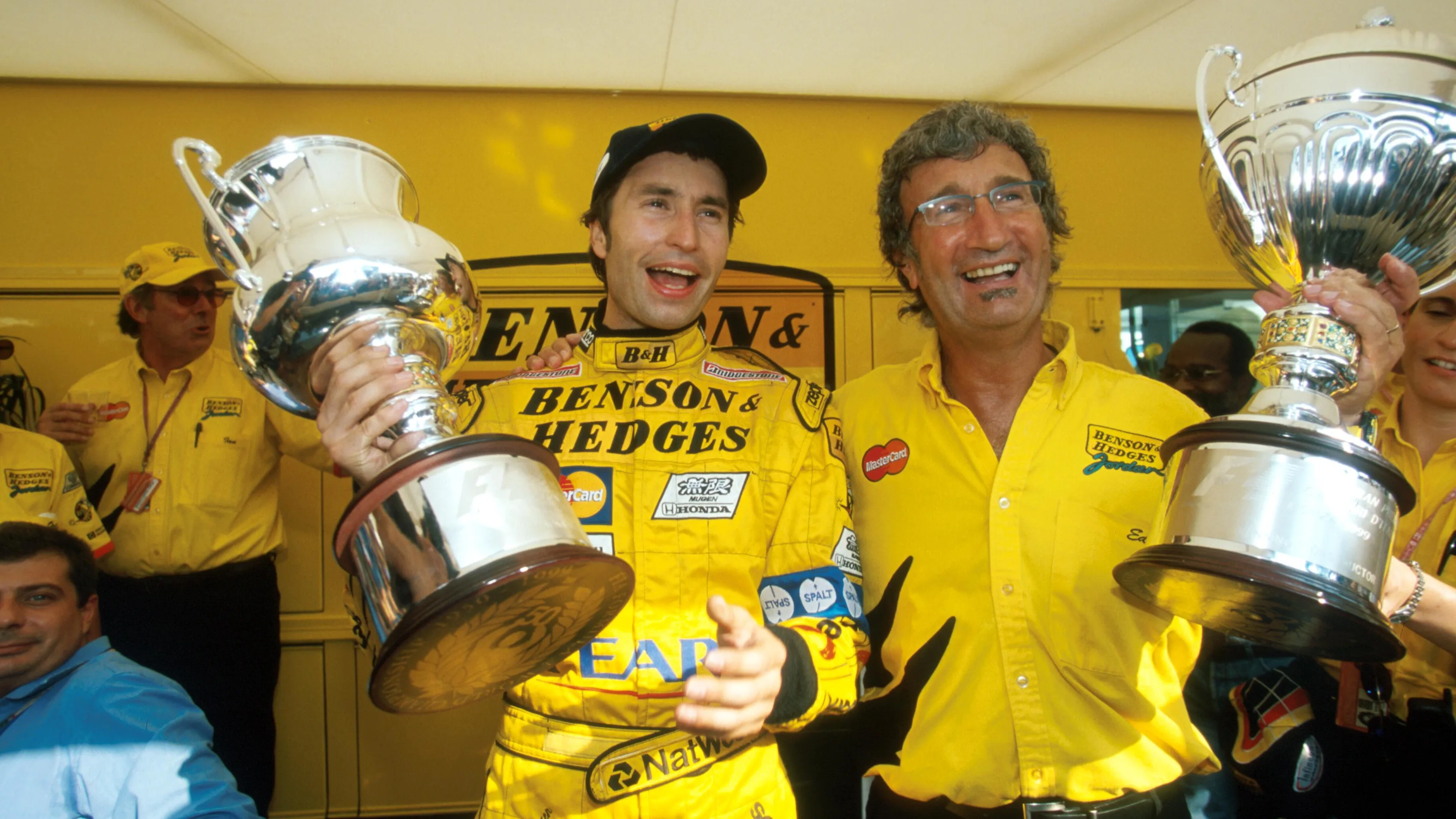 Heinz-Harald Frentzen(GER) Jordan Mugen Honda 199 celebrates his win with team boss Eddie Jordan,
