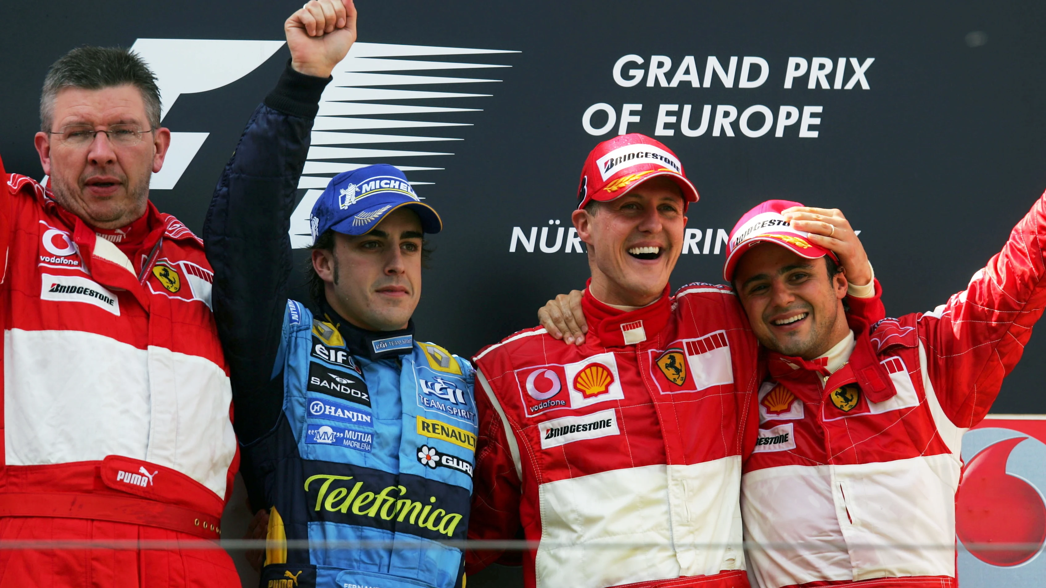The podium (L to R): Ross Brawn (GBR) Ferrari Technical Director; Fernando Alonso (ESP) Renault,