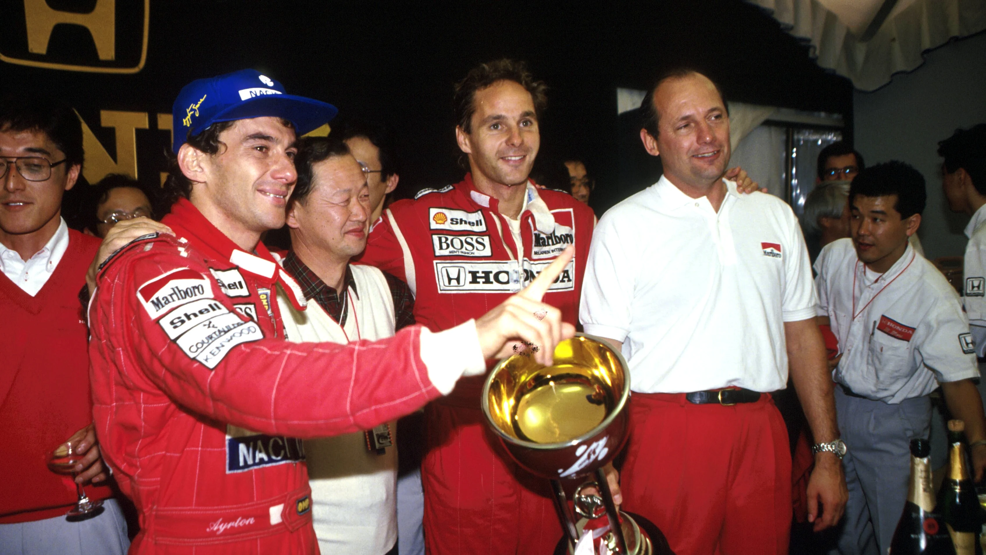 Ayrton Senna (BRA) McLaren, celebrates finishing second and securing his final Formula One world