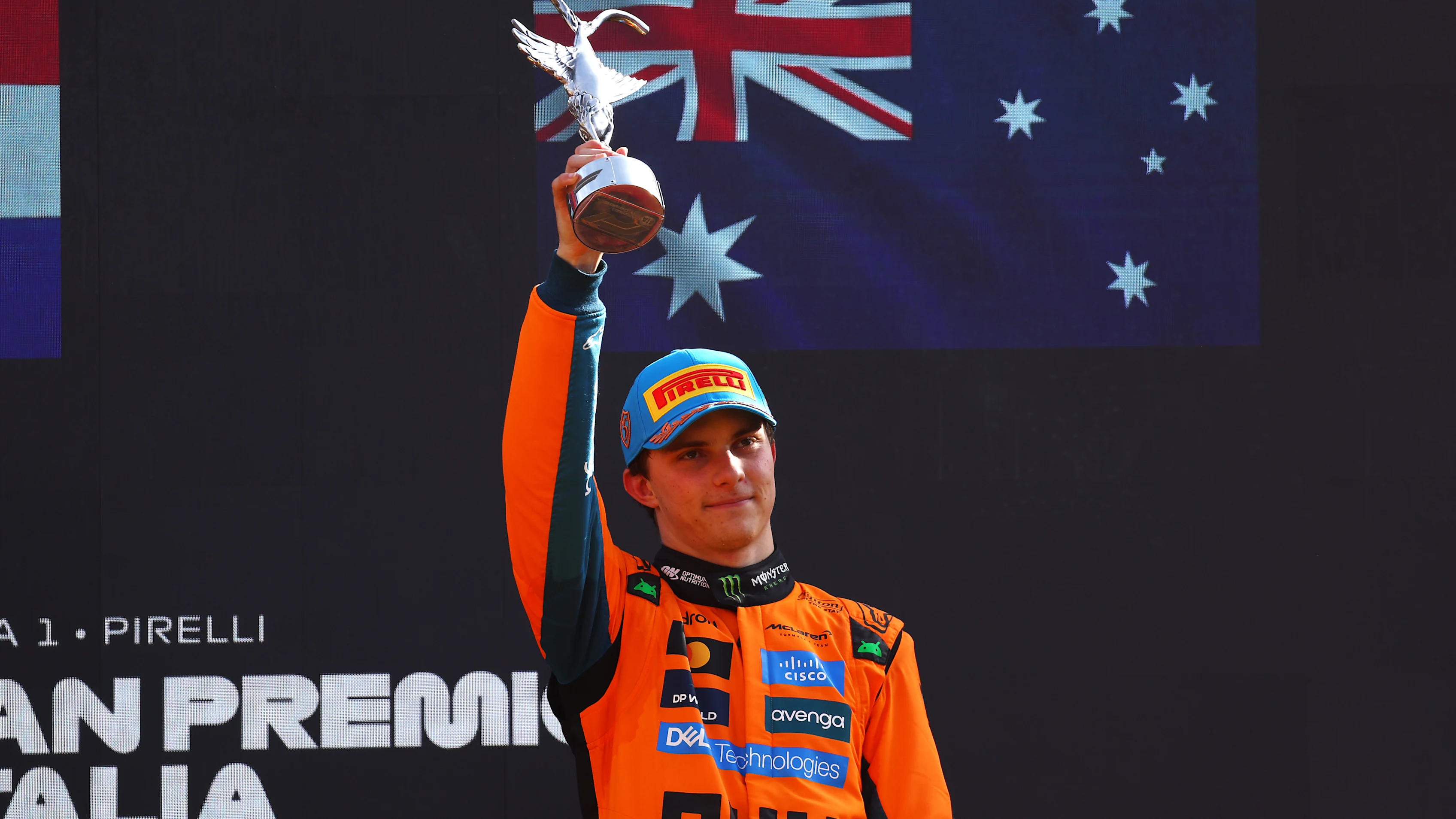 MONZA, ITALY - SEPTEMBER 07: Third placed Oscar Piastri of Australia and McLaren lifts his trophy
