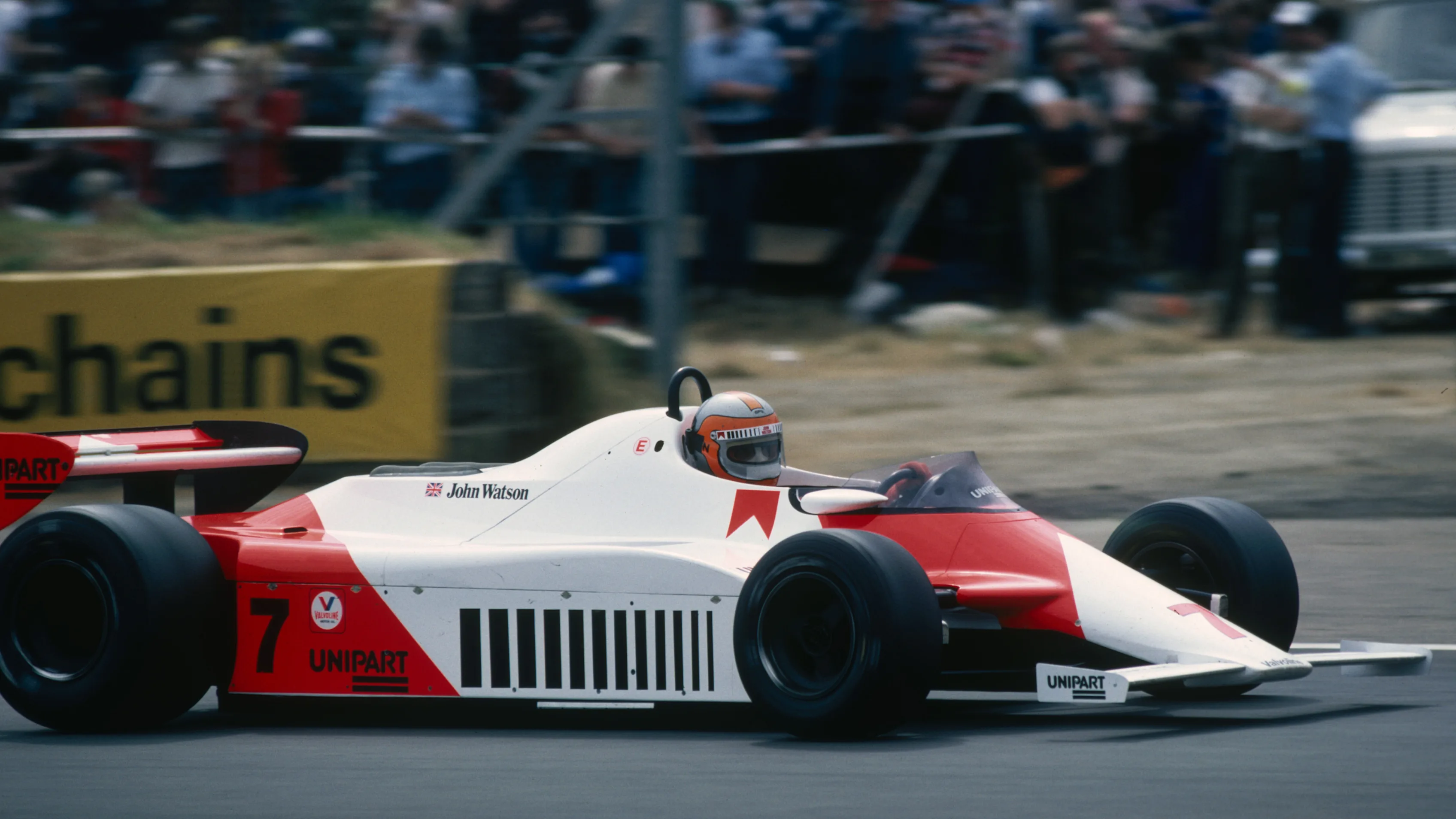 SILVERSTONE - JULY 18:  McLaren-Ford driver John Watson of Great Britain on his way to winning the