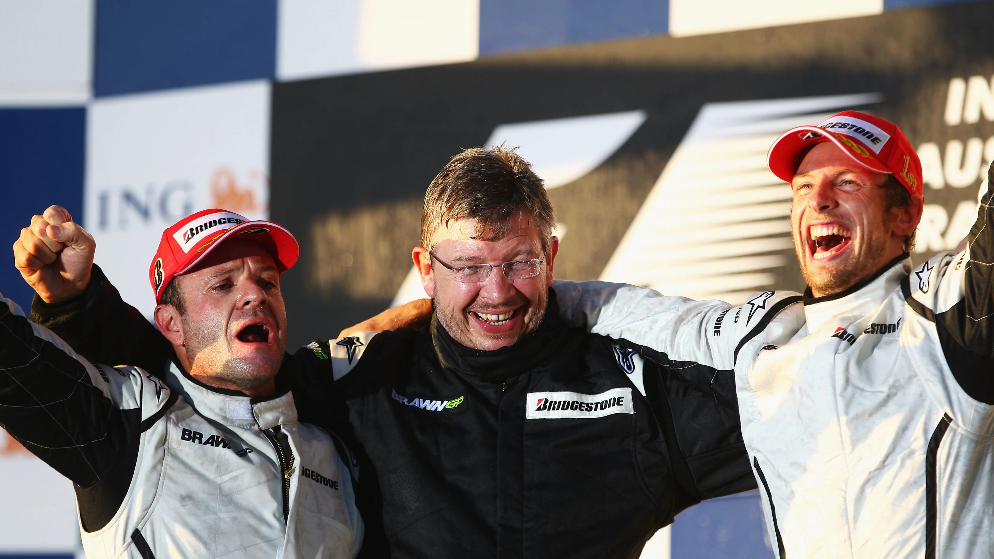 MELBOURNE, AUSTRALIA - MARCH 29:  Race winner Jenson Button (R) of Great Britain and Brawn GP