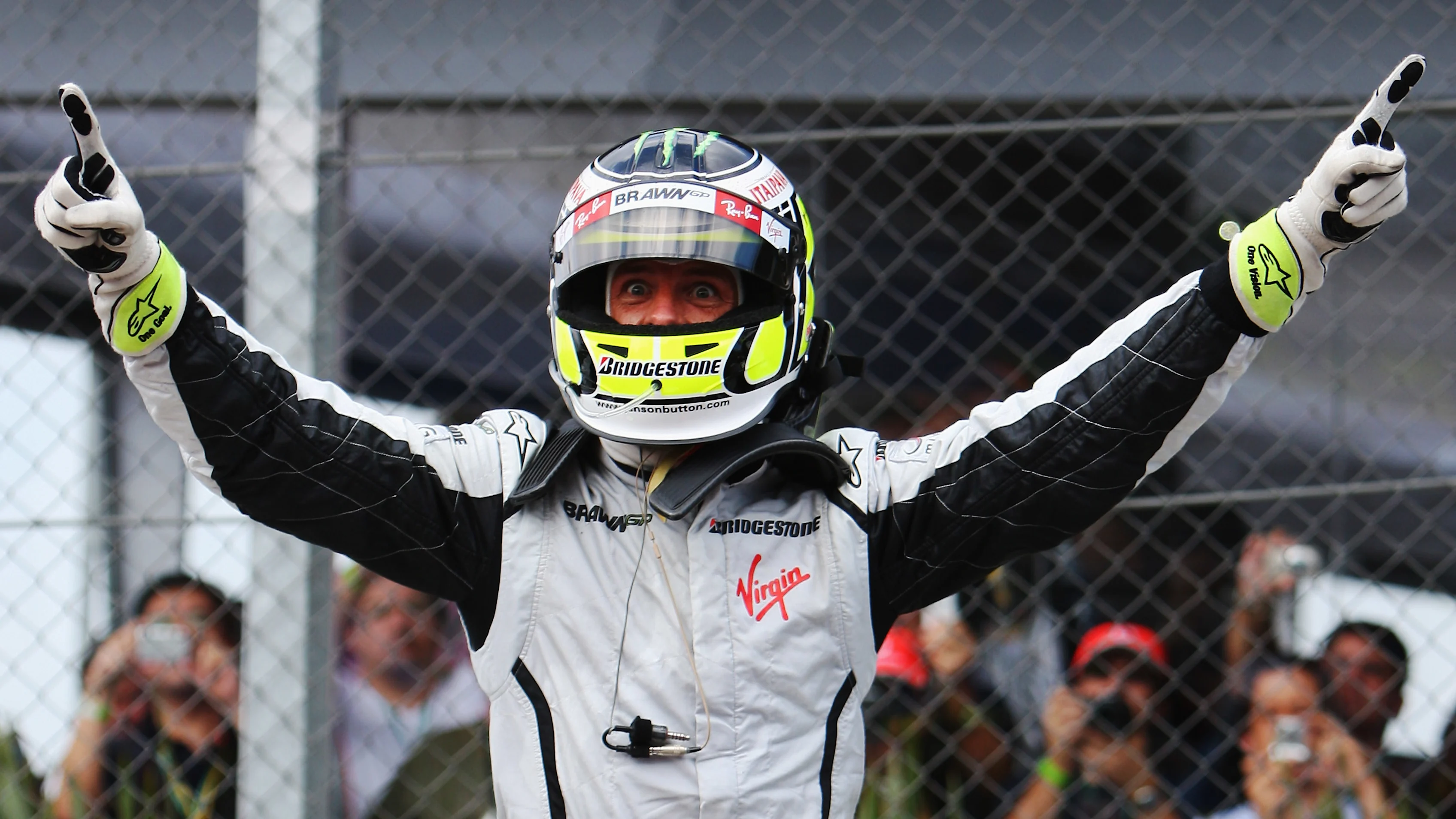 SAO PAULO, BRAZIL - OCTOBER 18:  Jenson Button of Great Britain and Brawn GP celebrates in parc