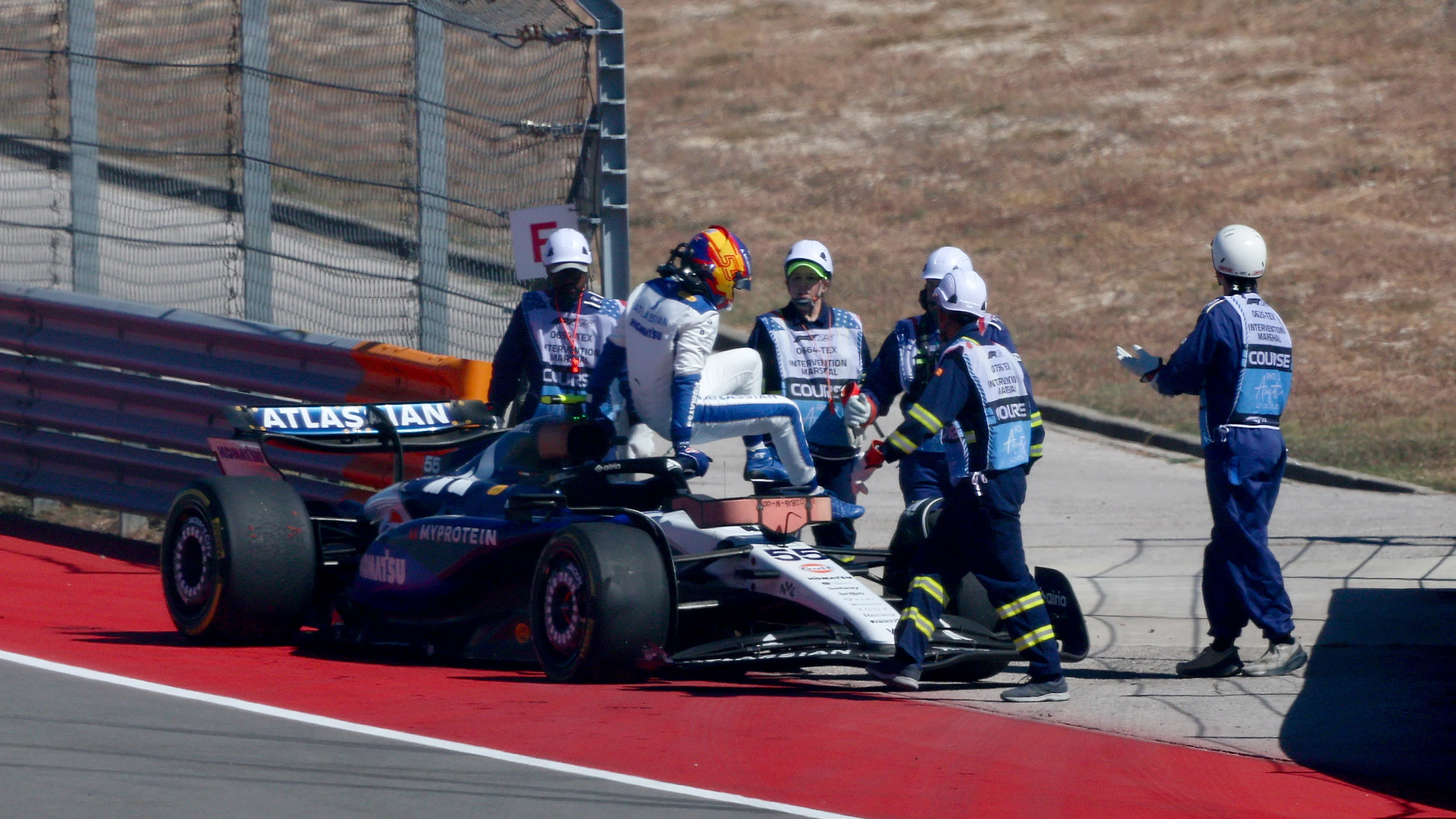 AUSTIN, TEXAS - OCTOBER 19: Carlos Sainz of Spain driving the (55) Williams FW47 Mercedes climbs