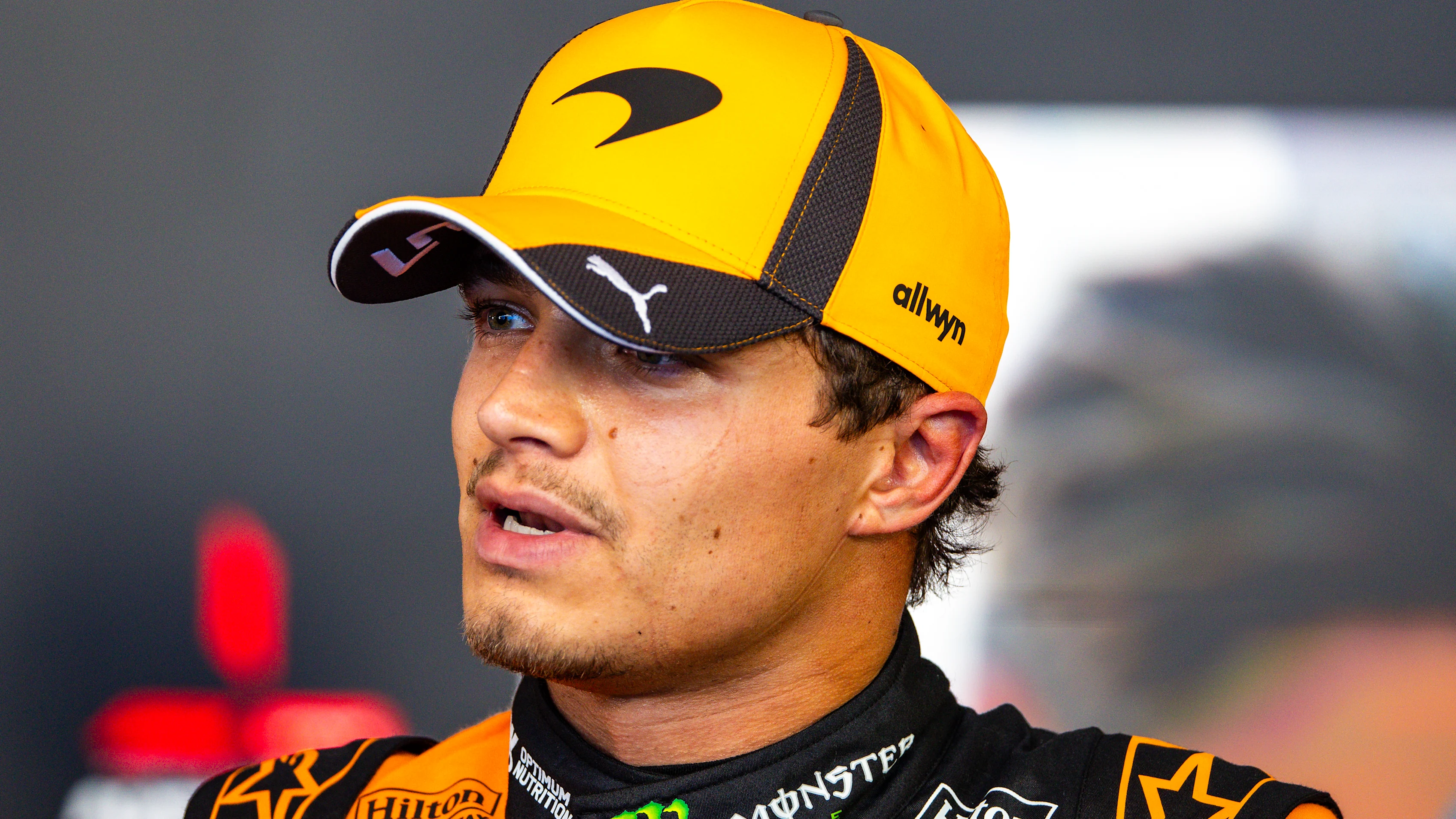 SPIELBERG, AUSTRIA - JUNE 27: Lando Norris of Great Britain and McLaren Mastercard F1 Team answers