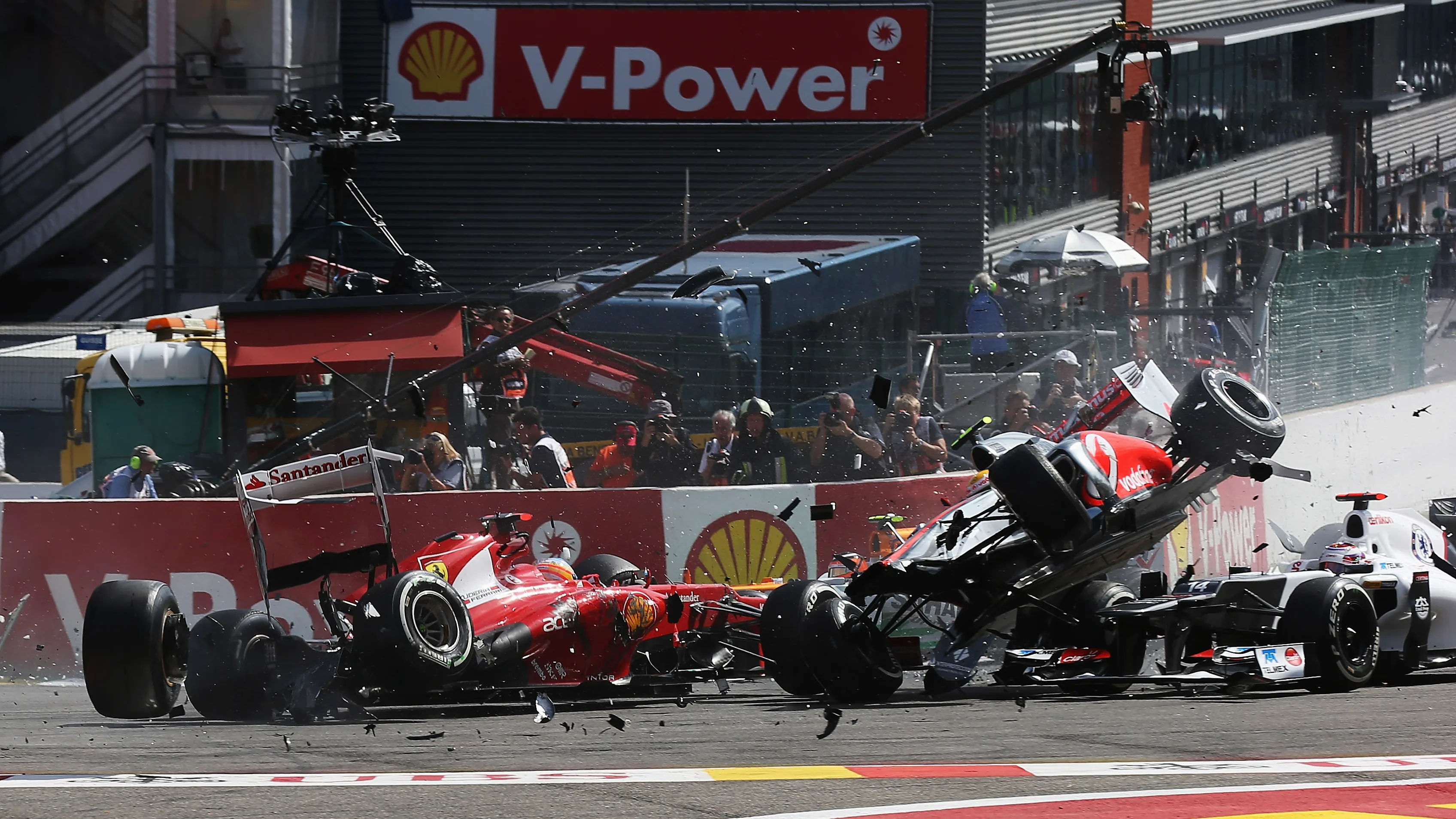 SPA, BELGIUM - SEPTEMBER 02:  Fernando Alonso (L) of Spain and Ferrari and Lewis Hamilton (R) of