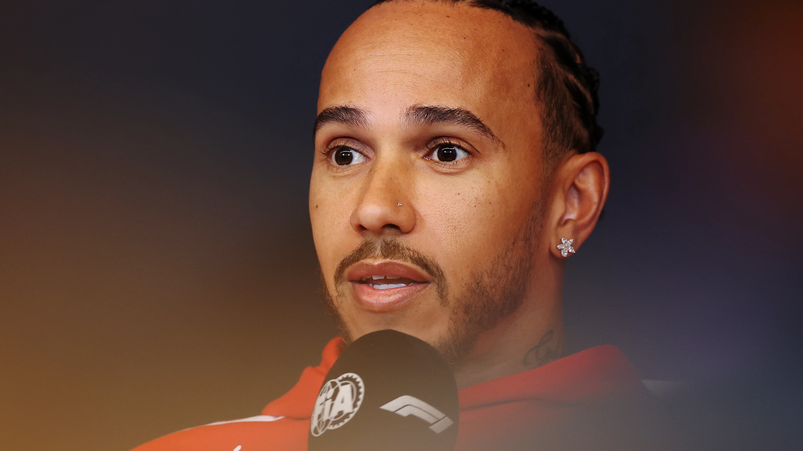 MONTREAL, QUEBEC - MAY 21: Lewis Hamilton of Great Britain and Scuderia Ferrari speaks in the