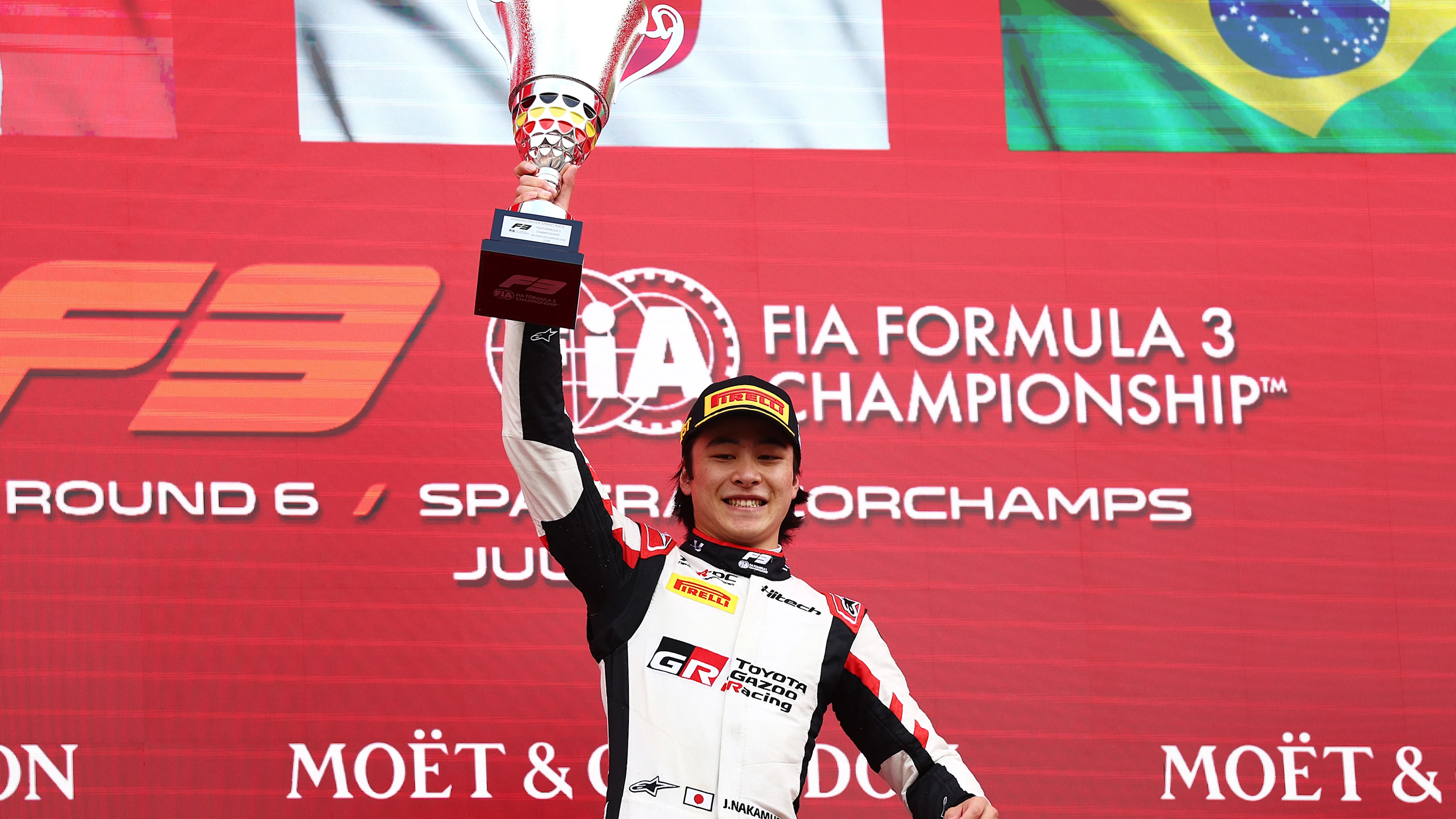 SPA, BELGIUM - JULY 18: Race winner Jin Nakamura of Japan and Hitech (25) celebrates on the podium