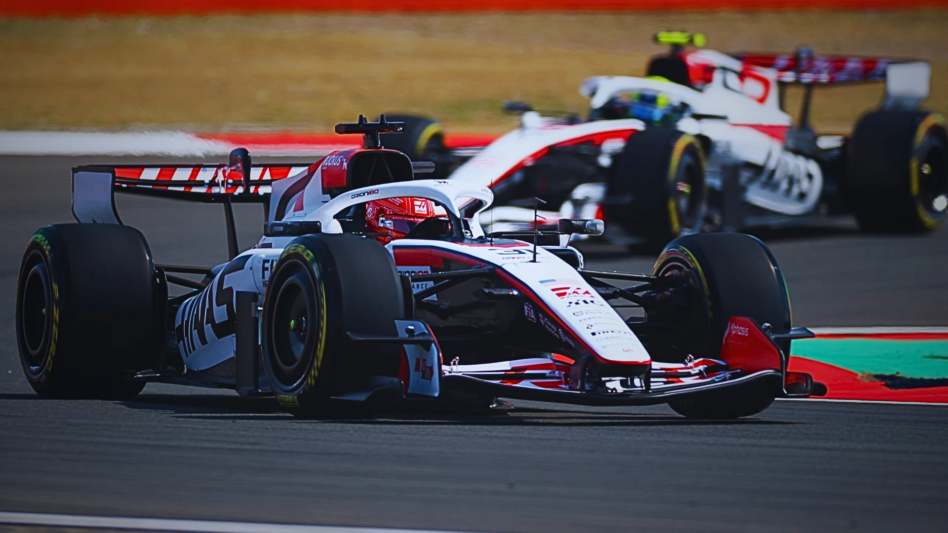 SHANGHAI, CHINA - MARCH 13: Esteban Ocon of France driving the (31) Haas F1 VF-26 Ferrari leads