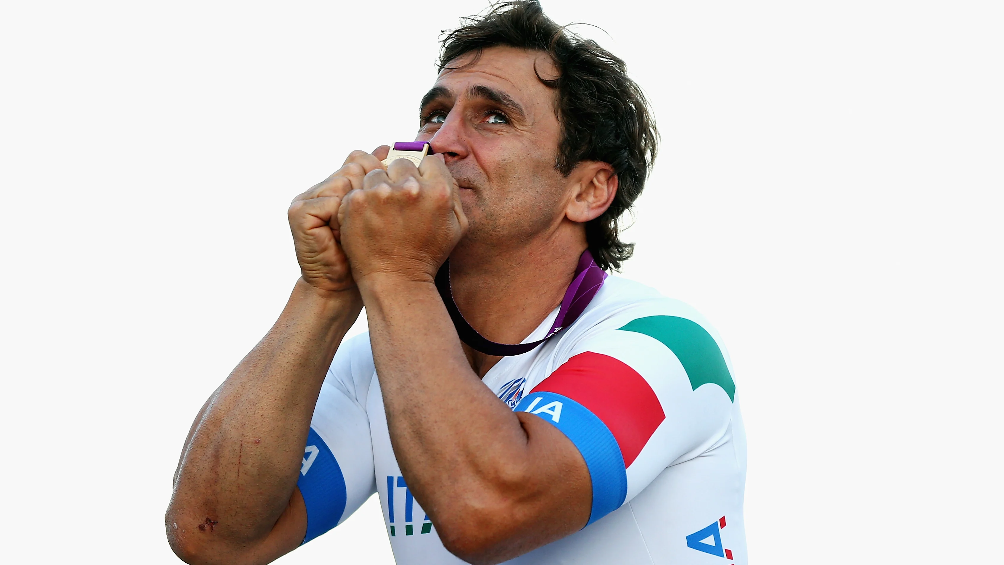 LONGFIELD, ENGLAND - SEPTEMBER 07: Alessandro Zanardi of Italy celebrates with his gold medal