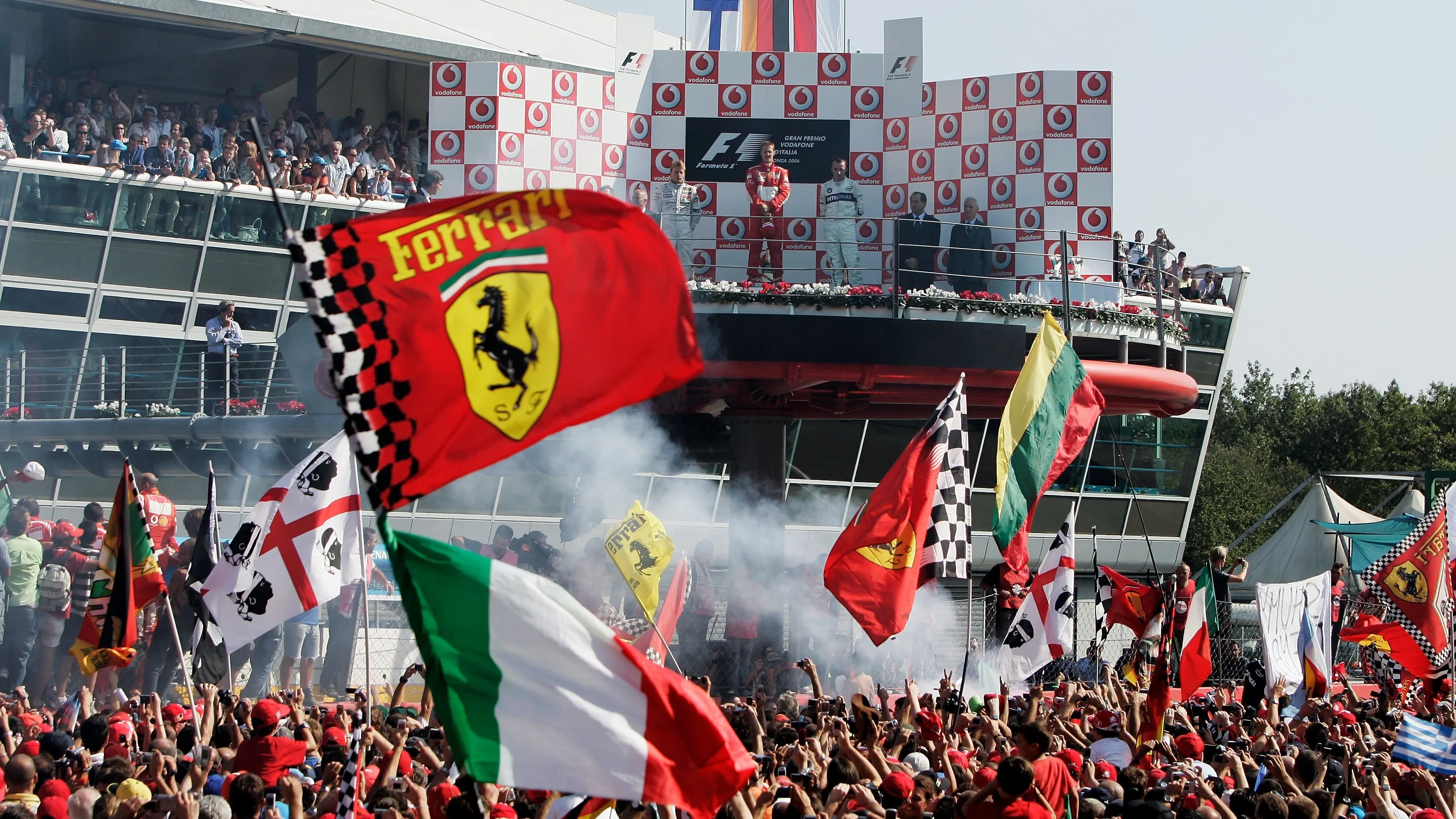 MONZA, ITALY - SEPTEMBER 10: Italian fans celebrate Michael Schumacher's win in the Italian Formula