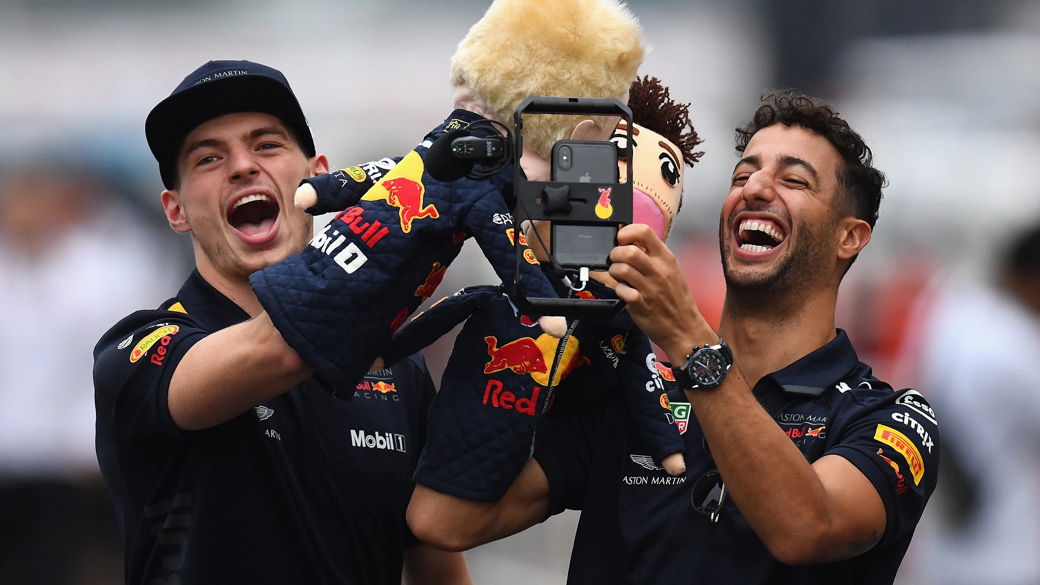 SUZUKA, JAPAN - OCTOBER 04: Daniel Ricciardo of Australia and Red Bull Racing and Max Verstappen of