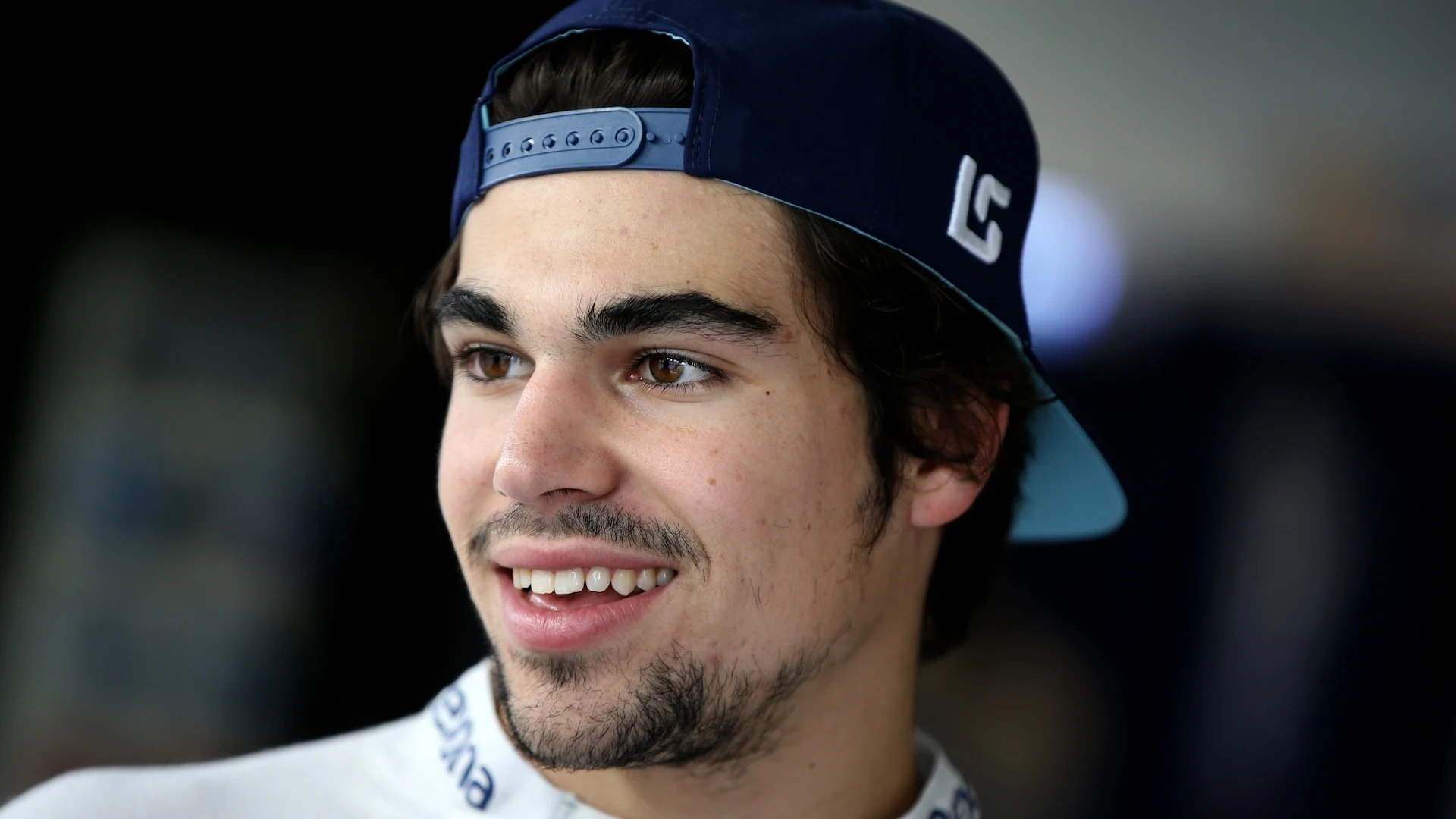 ABU DHABI, UNITED ARAB EMIRATES - NOVEMBER 25: Lance Stroll of Canada and Williams looks on before
