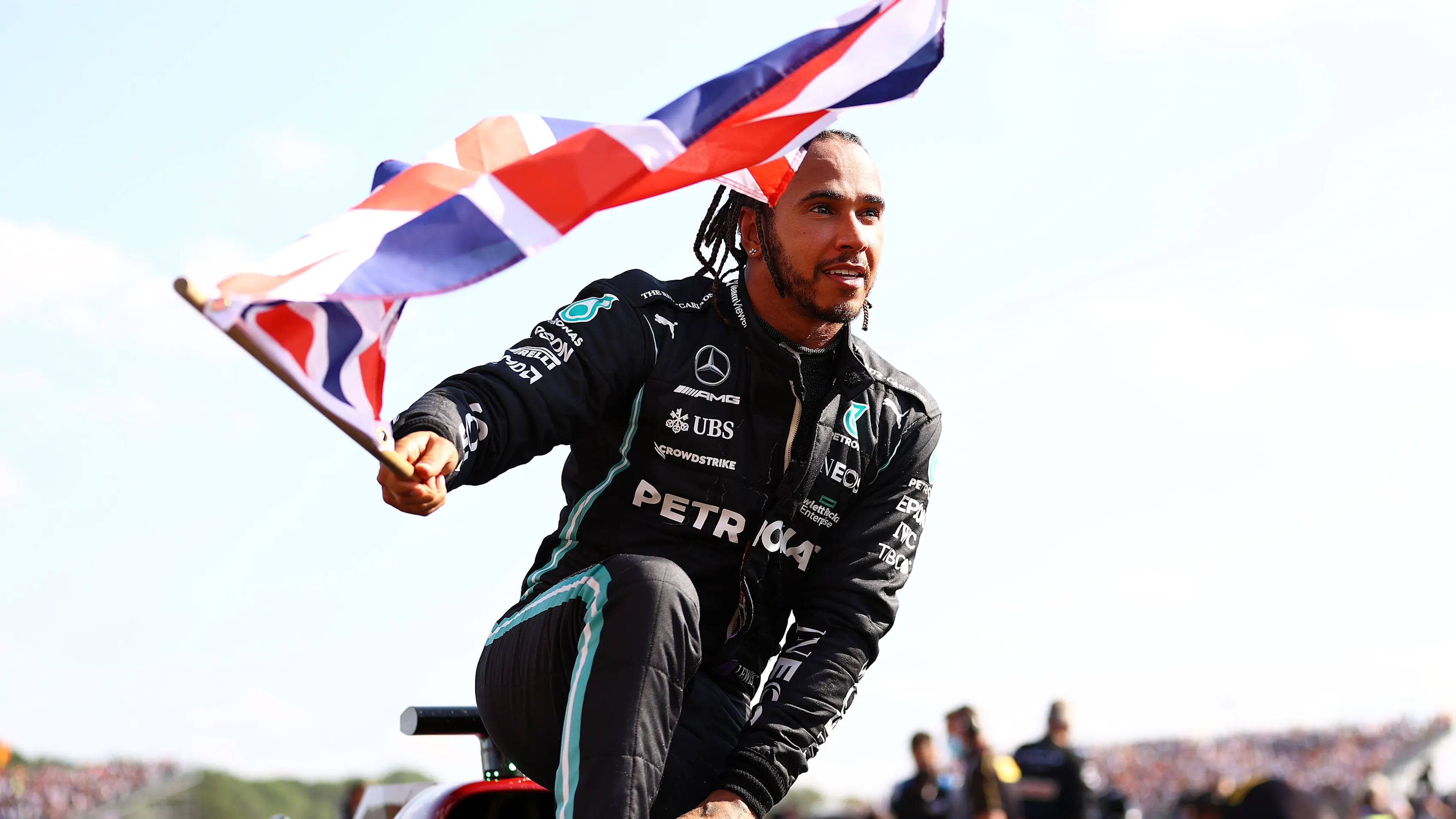 NORTHAMPTON, ENGLAND - JULY 18: Race winner Lewis Hamilton of Great Britain and Mercedes GP