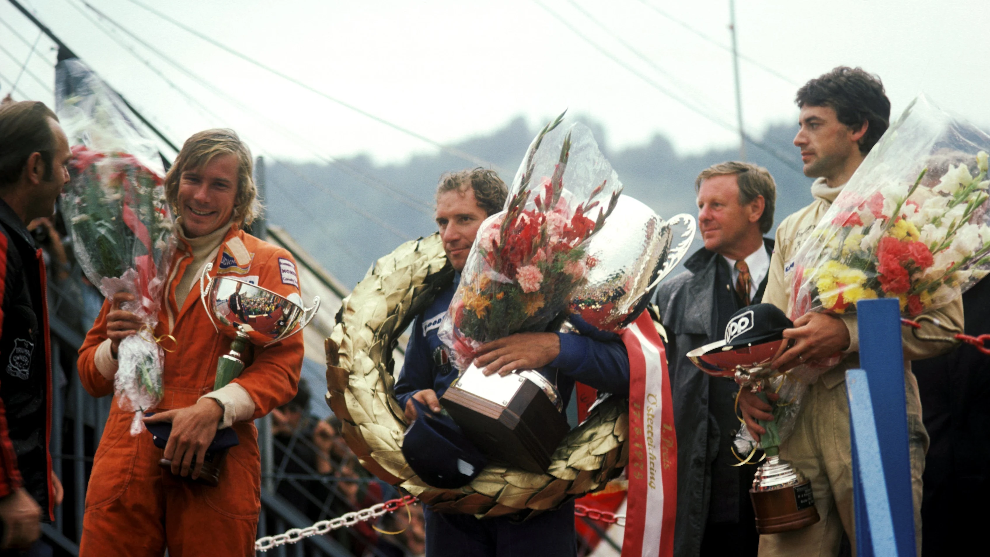 The podium of a rain shortened race (Only half points were awarded) (L to R): James Hunt (GBR)