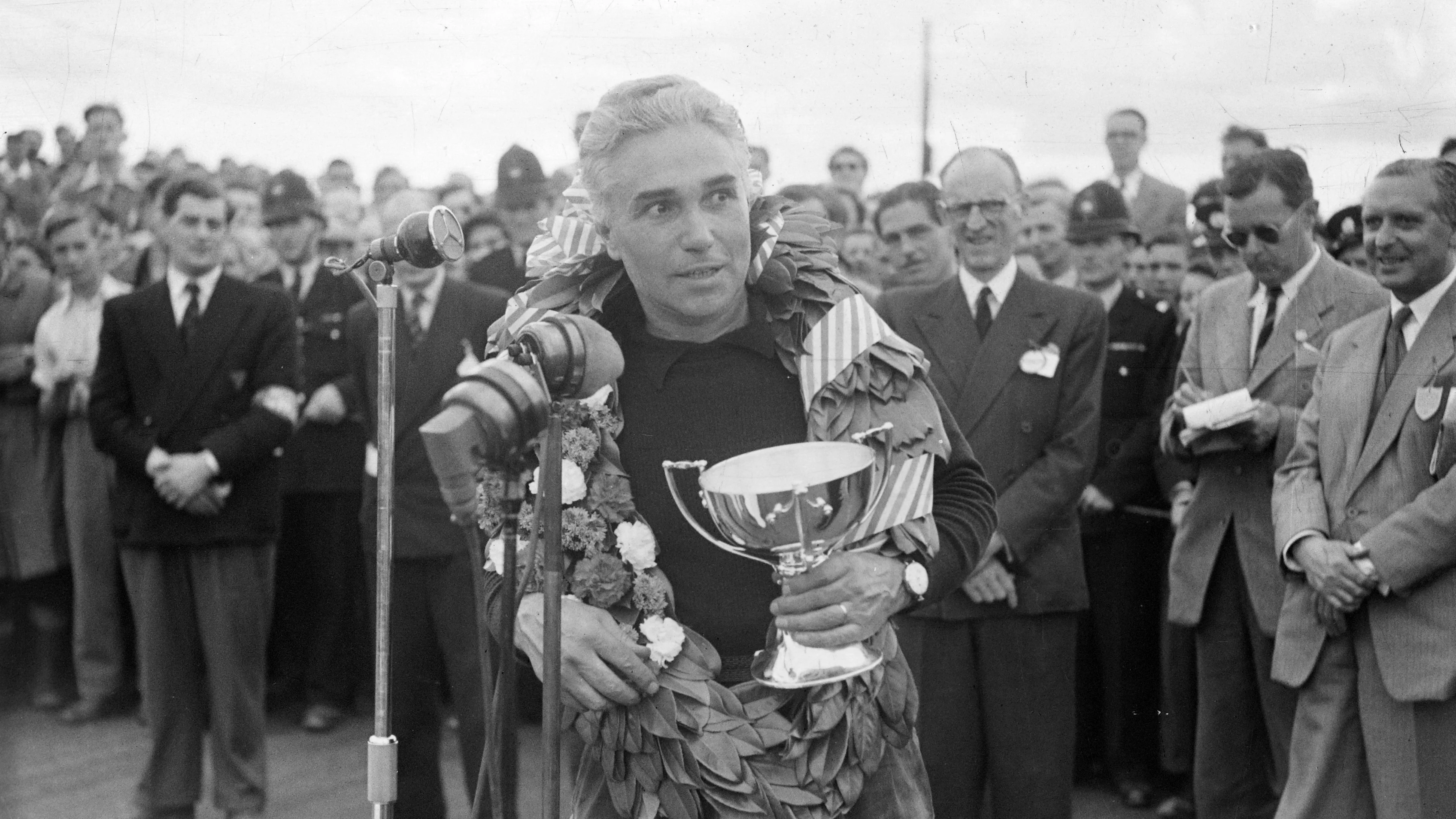 SILVERSTONE CIRCUIT, UNITED KINGDOM - JULY 19: Piero Taruffi celebrates second place during the