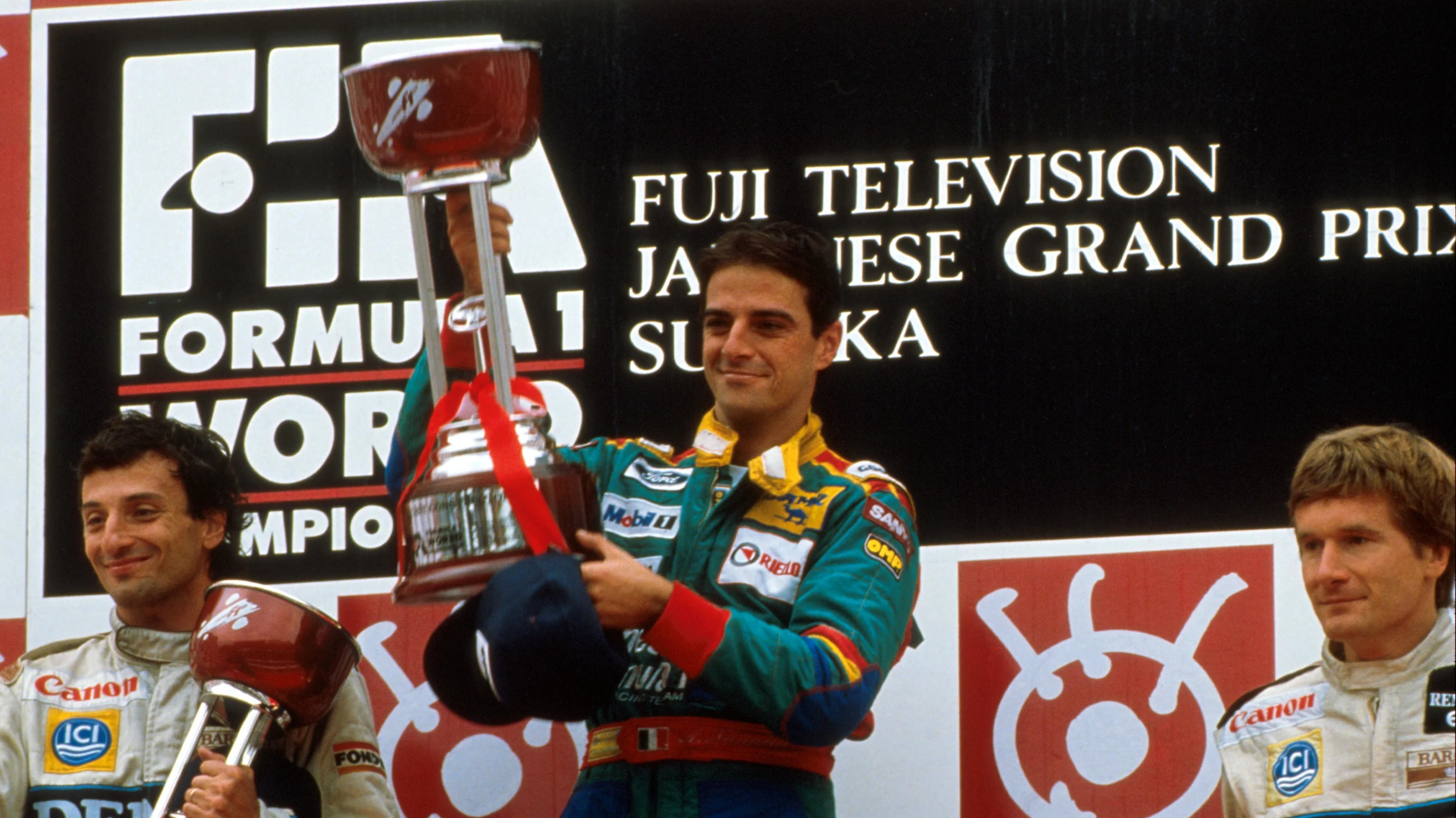 Alessandro Nannini (ITA) (centre) celebrated his first ever GP victory. Alongside him are Williams