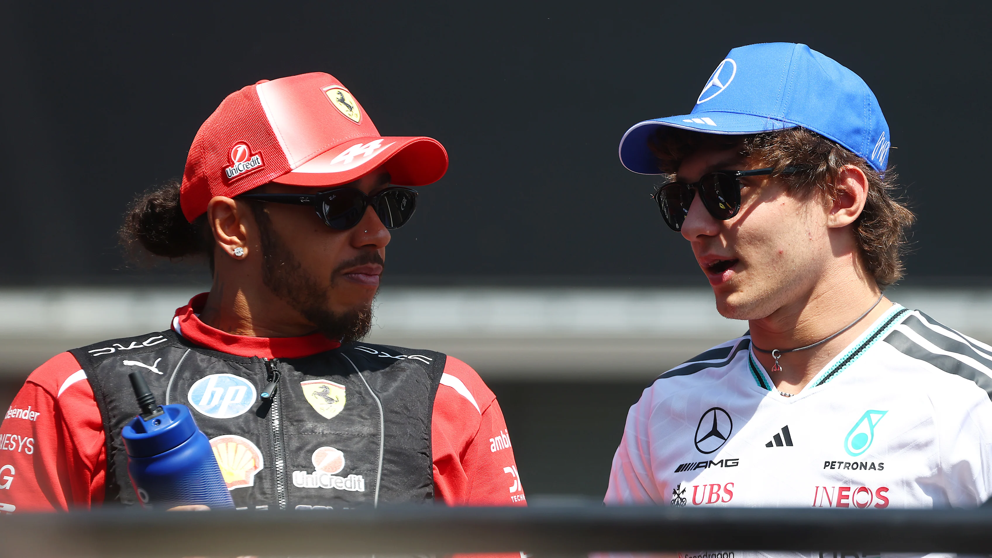 BUDAPEST, HUNGARY - JULY 26: Lewis Hamilton of Great Britain and Scuderia Ferrari and Andrea Kimi