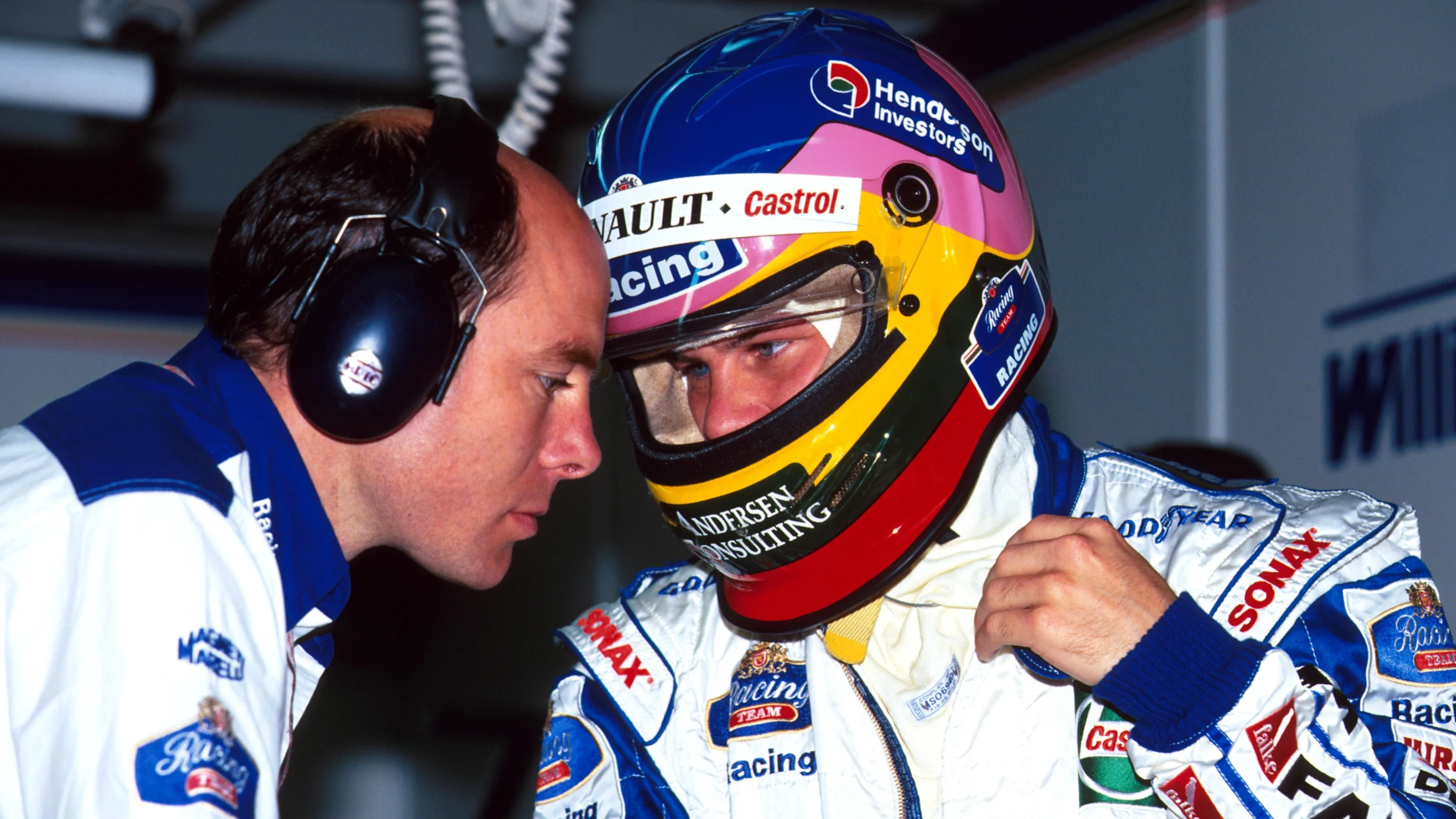 Jacques Villeneuve (CDN) Williams FW19 with his engineer Jock Clear (GBR) left Formula One World