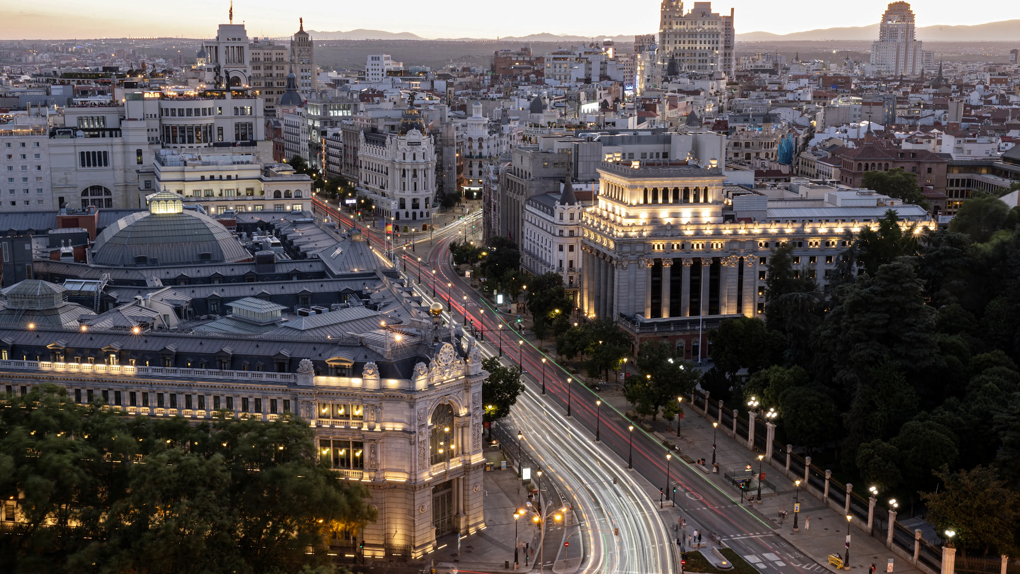 A general view of Madrid cityscape illuminated at dusk is pictured on July 24, 2025. (Photo by