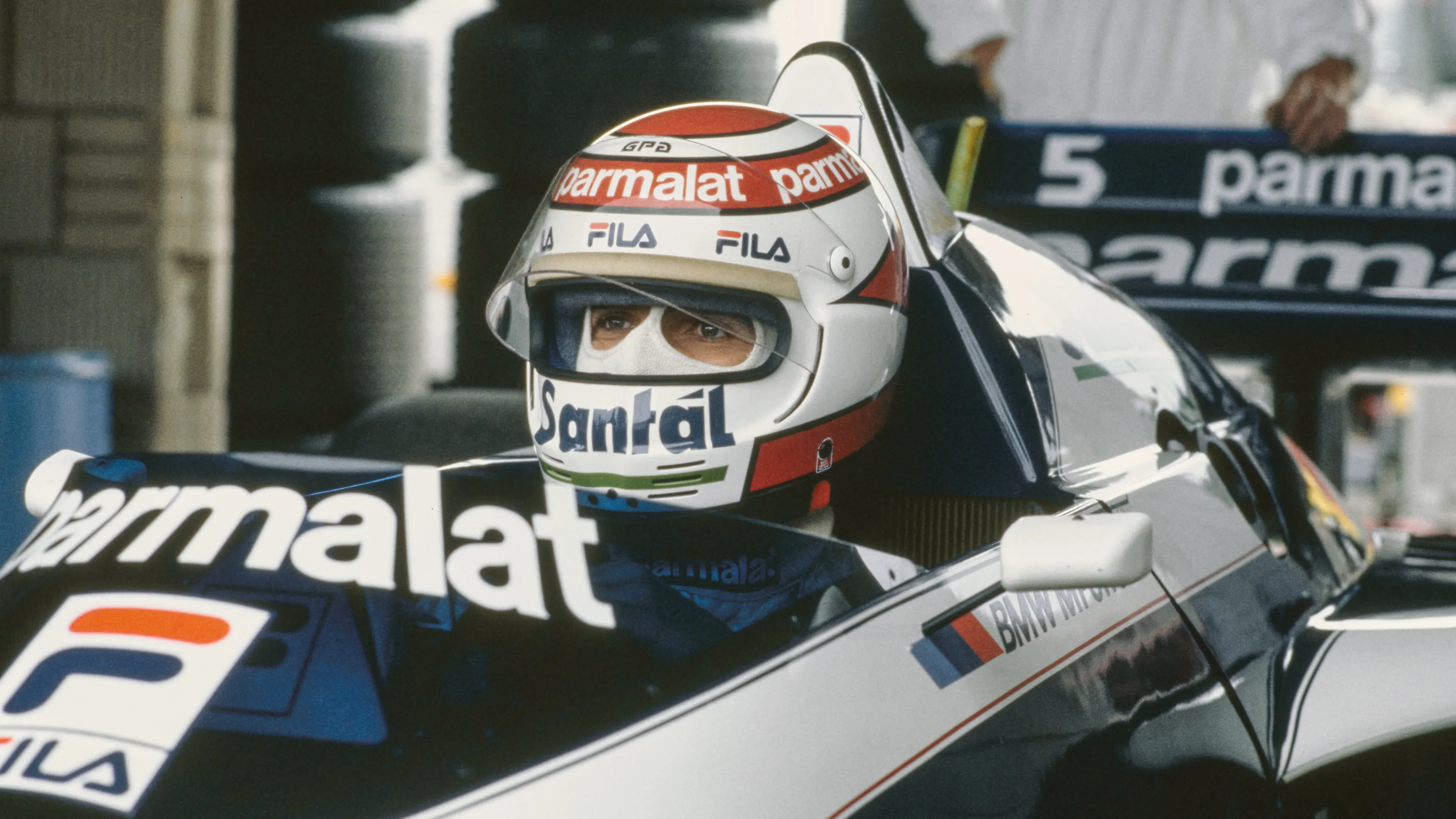 Formula One Grand Prix racing driver Nelson Piquet, driving for BMW-Brabham, sits in the BT52 in