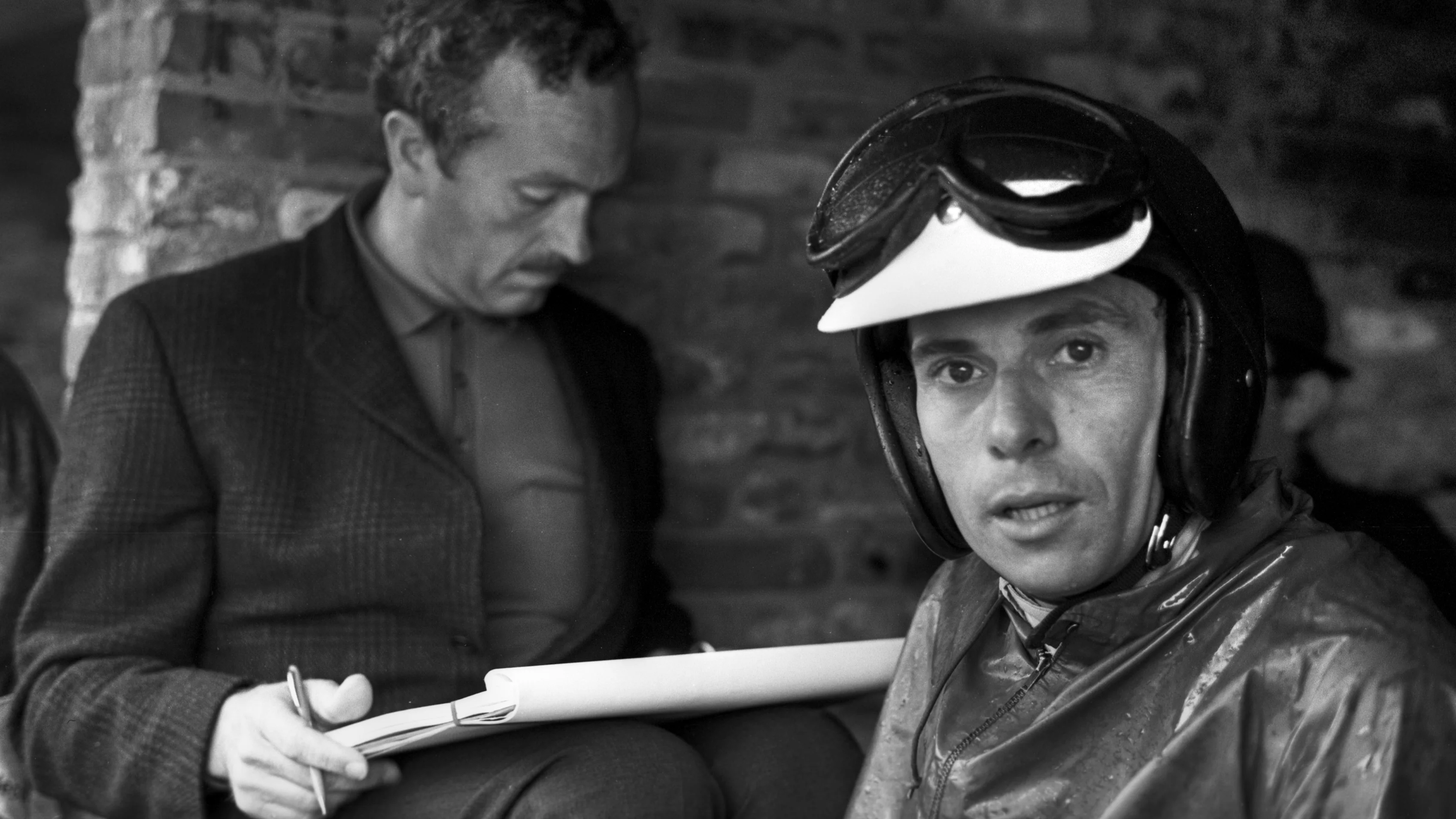 Jim Clark, Colin Chapman, Grand Prix of Netherlands, Zandvoort, 18 July 1965. (Photo by Bernard