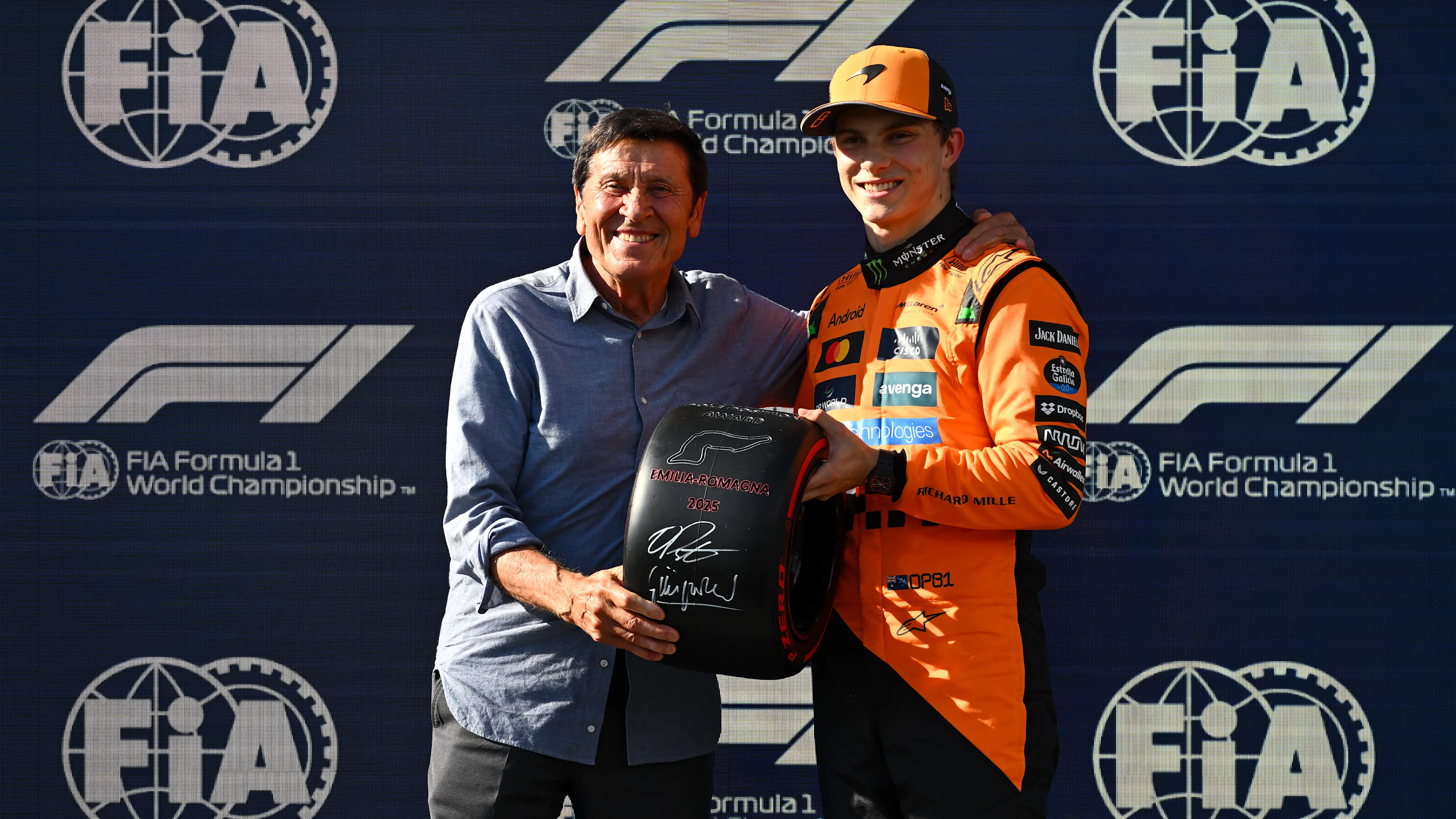 IMOLA, ITALY - MAY 17: Oscar Piastri of Australia and McLaren is presented with the Pirelli Pole