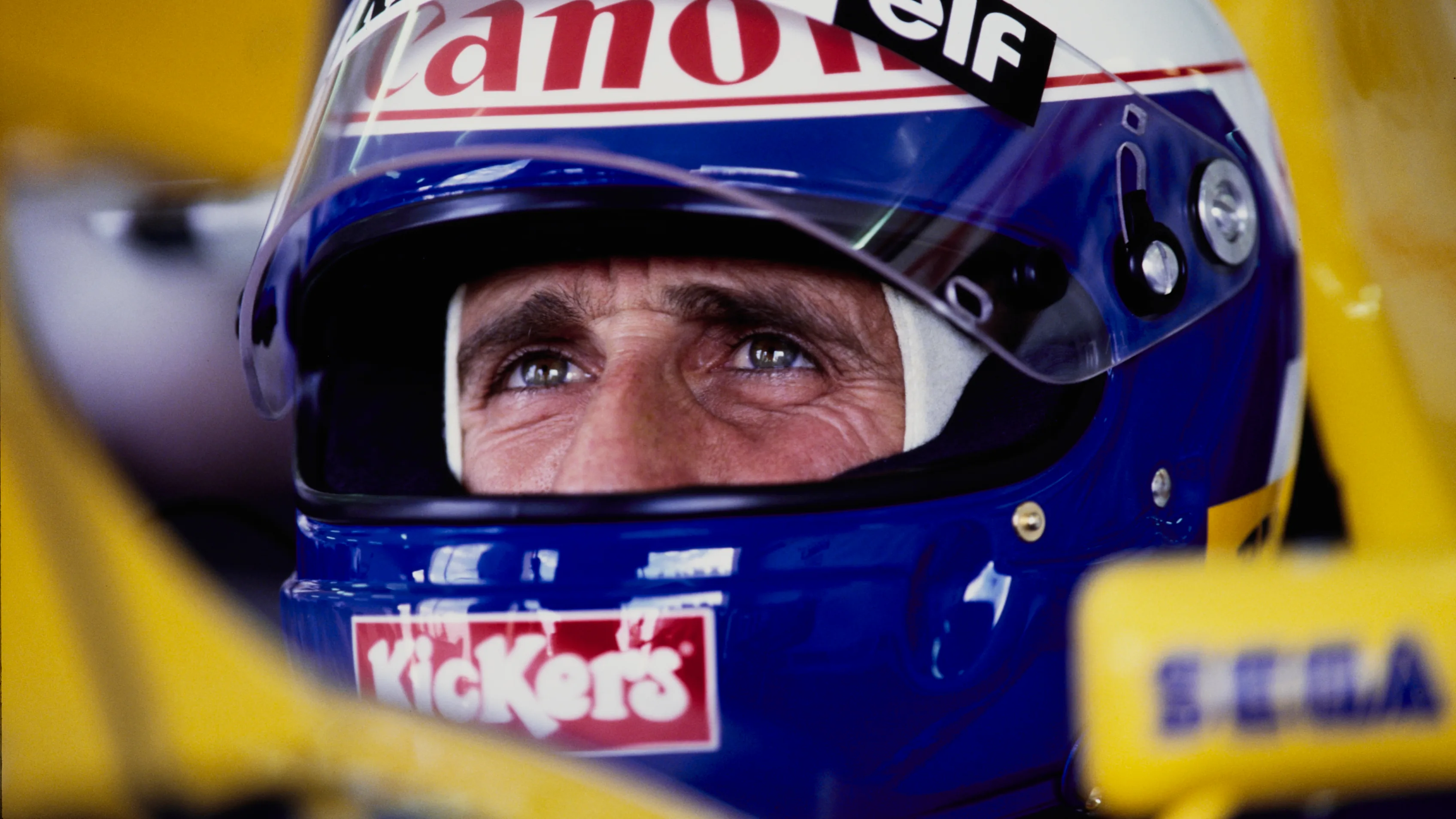 Alain Prost from France checks the lap times from the cockpit of the #2 Canon Williams Renault