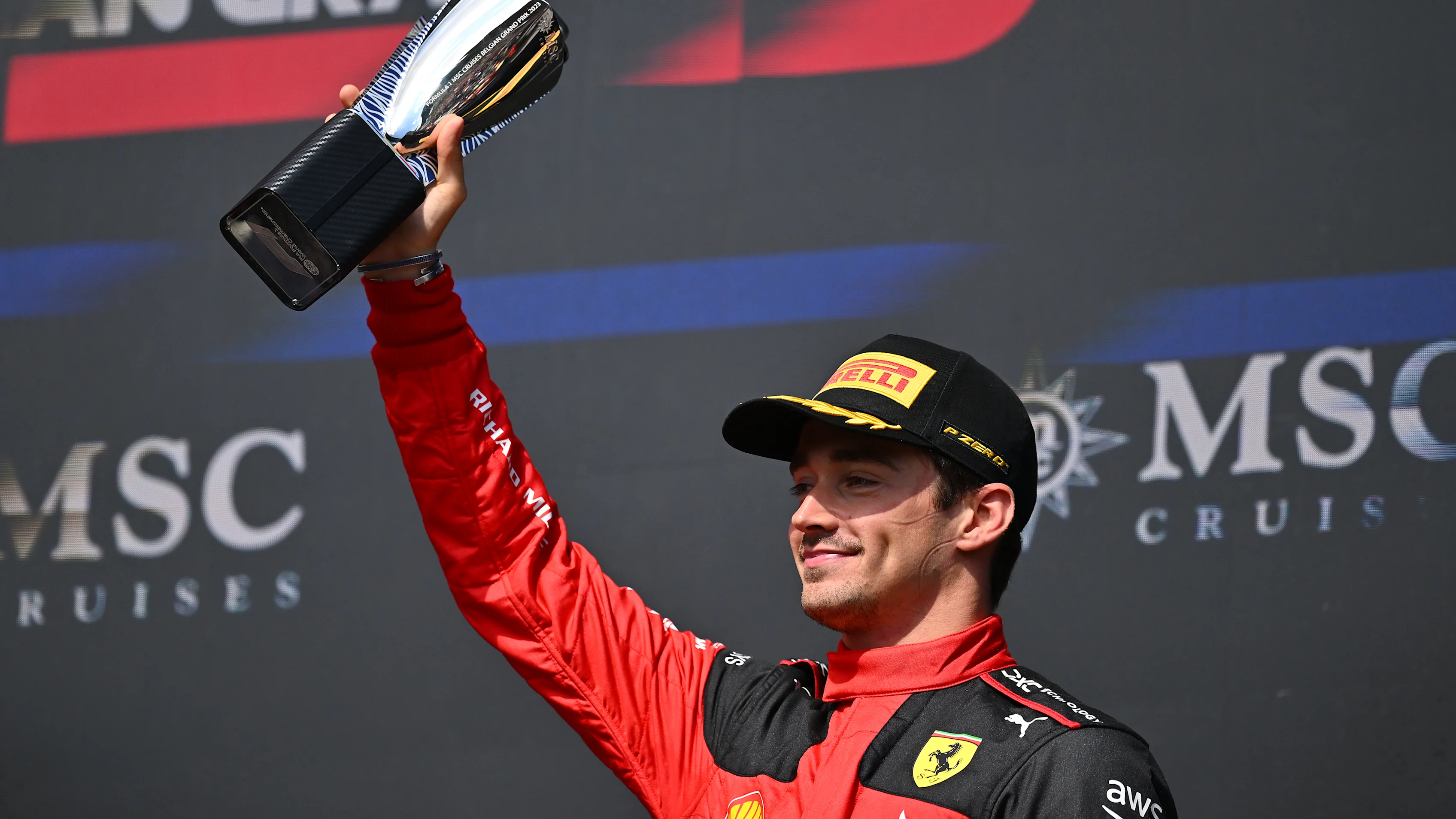 SPA, BELGIUM - JULY 30: Third placed Charles Leclerc of Monaco and Ferrari celebrates on the podium