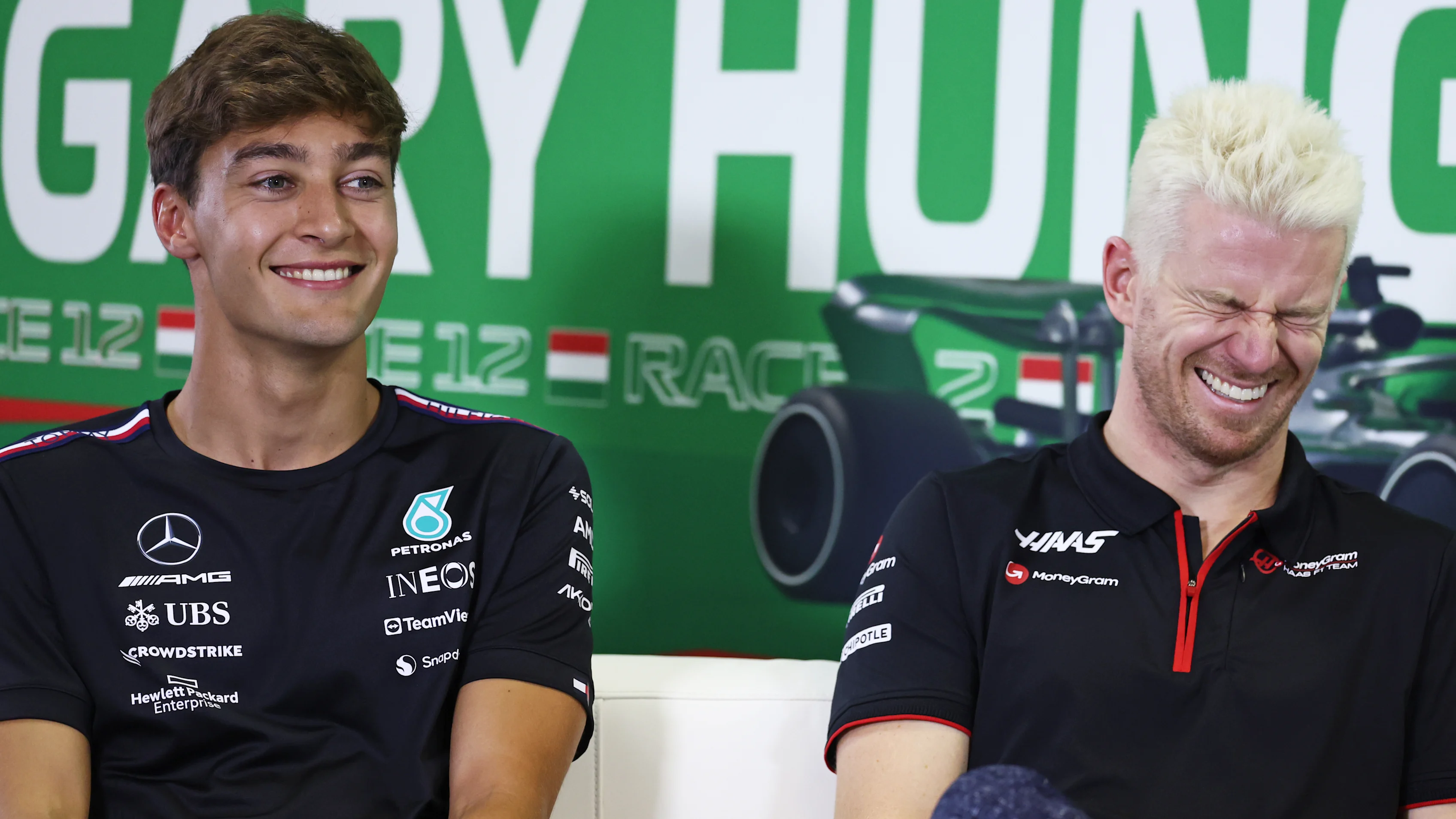 BUDAPEST, HUNGARY - JULY 20: George Russell of Great Britain and Mercedes and Nico Hulkenberg of
