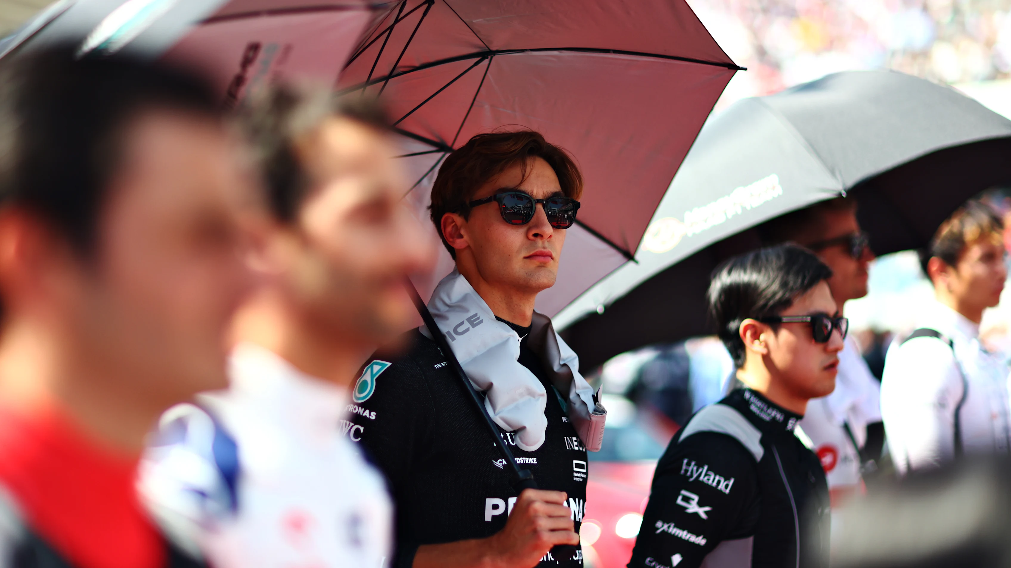 MEXICO CITY, MEXICO - OCTOBER 29: George Russell of Great Britain and Mercedes stands for the