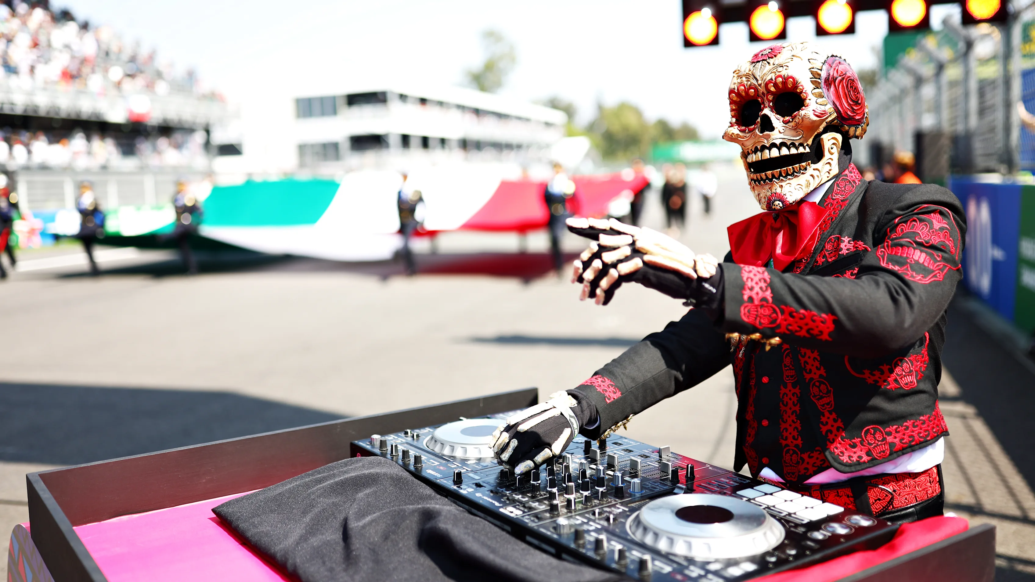 MEXICO CITY, MEXICO - OCTOBER 29: Fermin La Calaca performs on the grid prior to the F1 Grand Prix