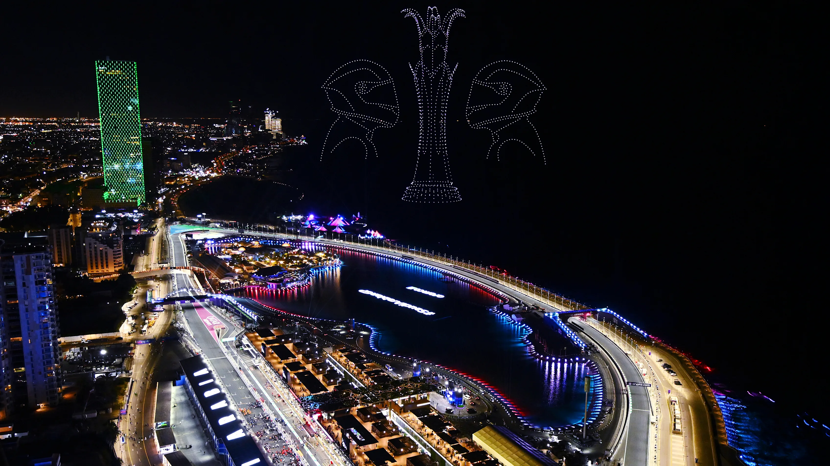 JEDDAH, SAUDI ARABIA - MARCH 19: A drone light display showing racing drivers is seen over the grid