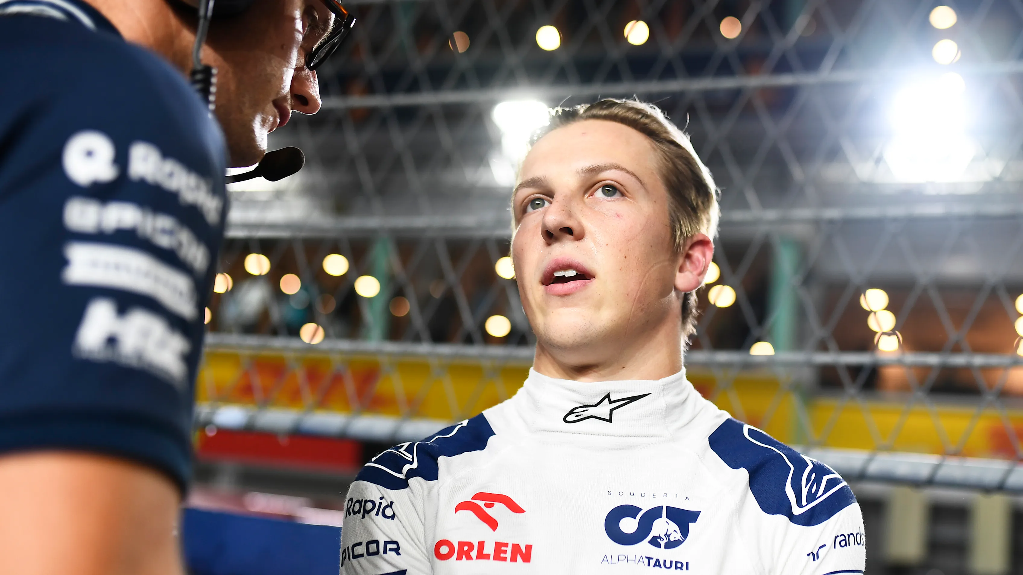 SINGAPORE, SINGAPORE - SEPTEMBER 17: Liam Lawson of New Zealand and Scuderia AlphaTauri prepares to