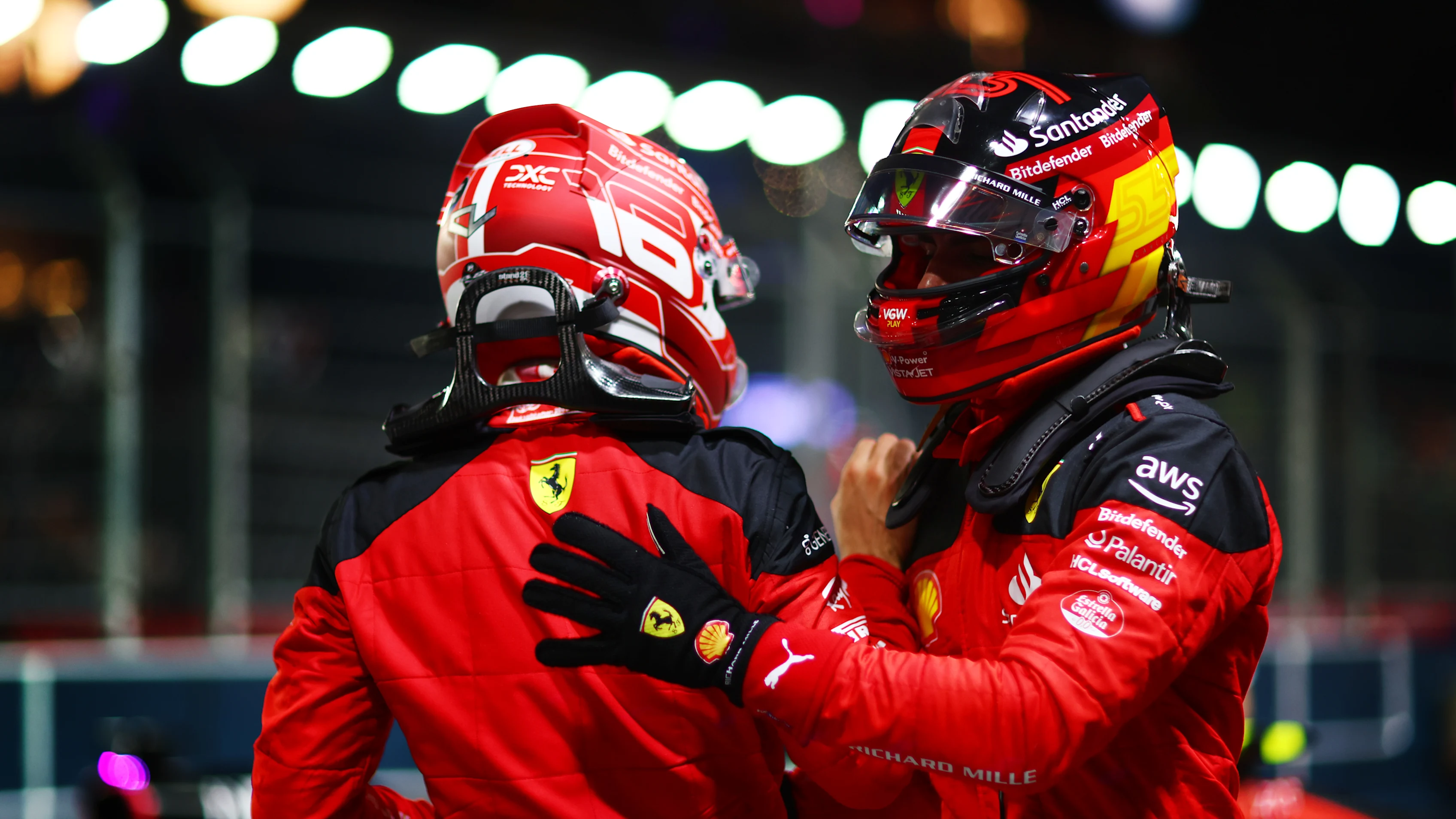SINGAPORE, SINGAPORE - SEPTEMBER 16: Pole position qualifier Carlos Sainz of Spain and Ferrari
