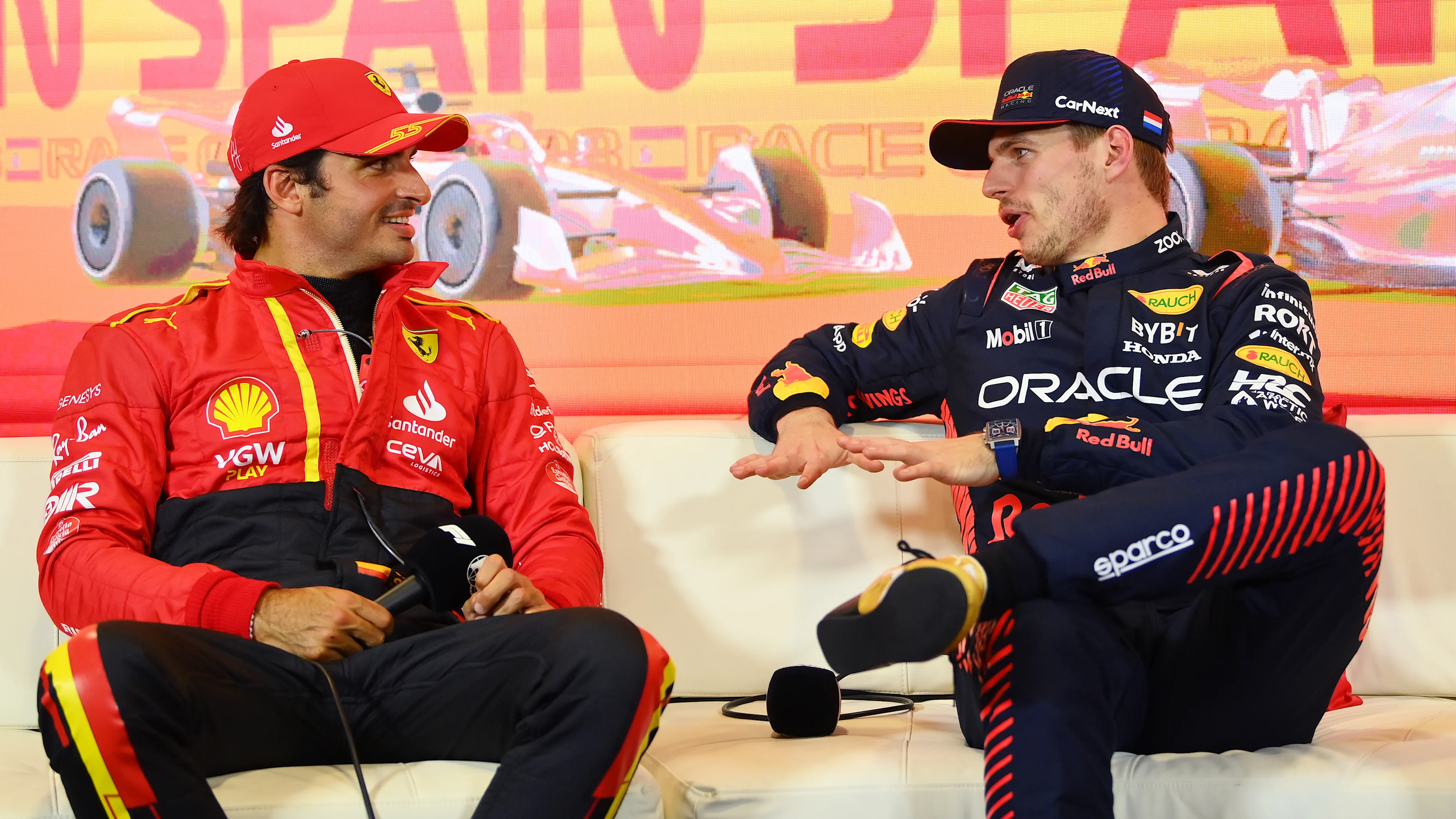BARCELONA, SPAIN - JUNE 03: Second placed qualifier Carlos Sainz of Spain and Ferrari (L) and Pole