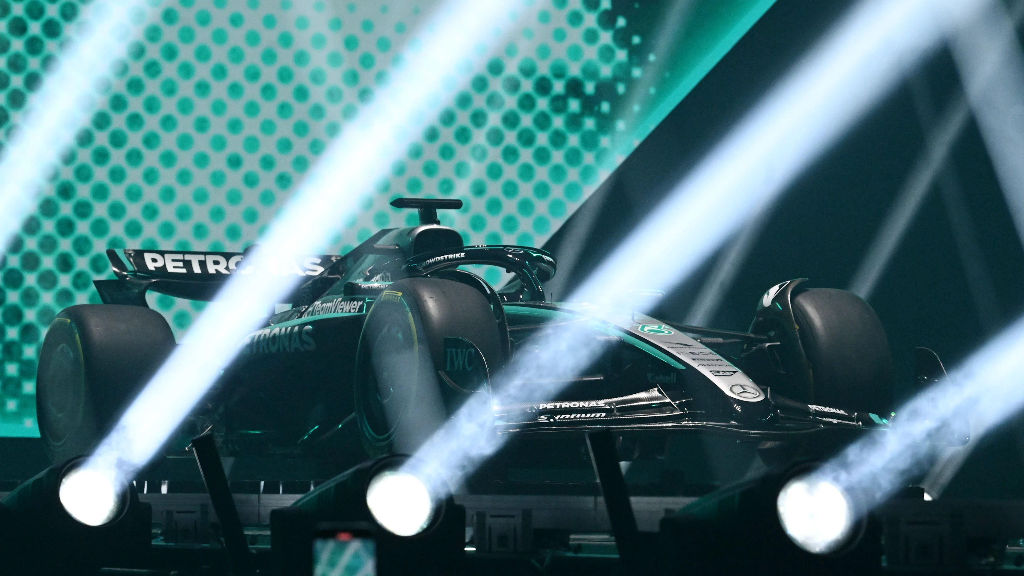 LONDON, ENGLAND - FEBRUARY 18: The Mercedes AMG Petronas F1 Team reveals its 2025 livery on stage