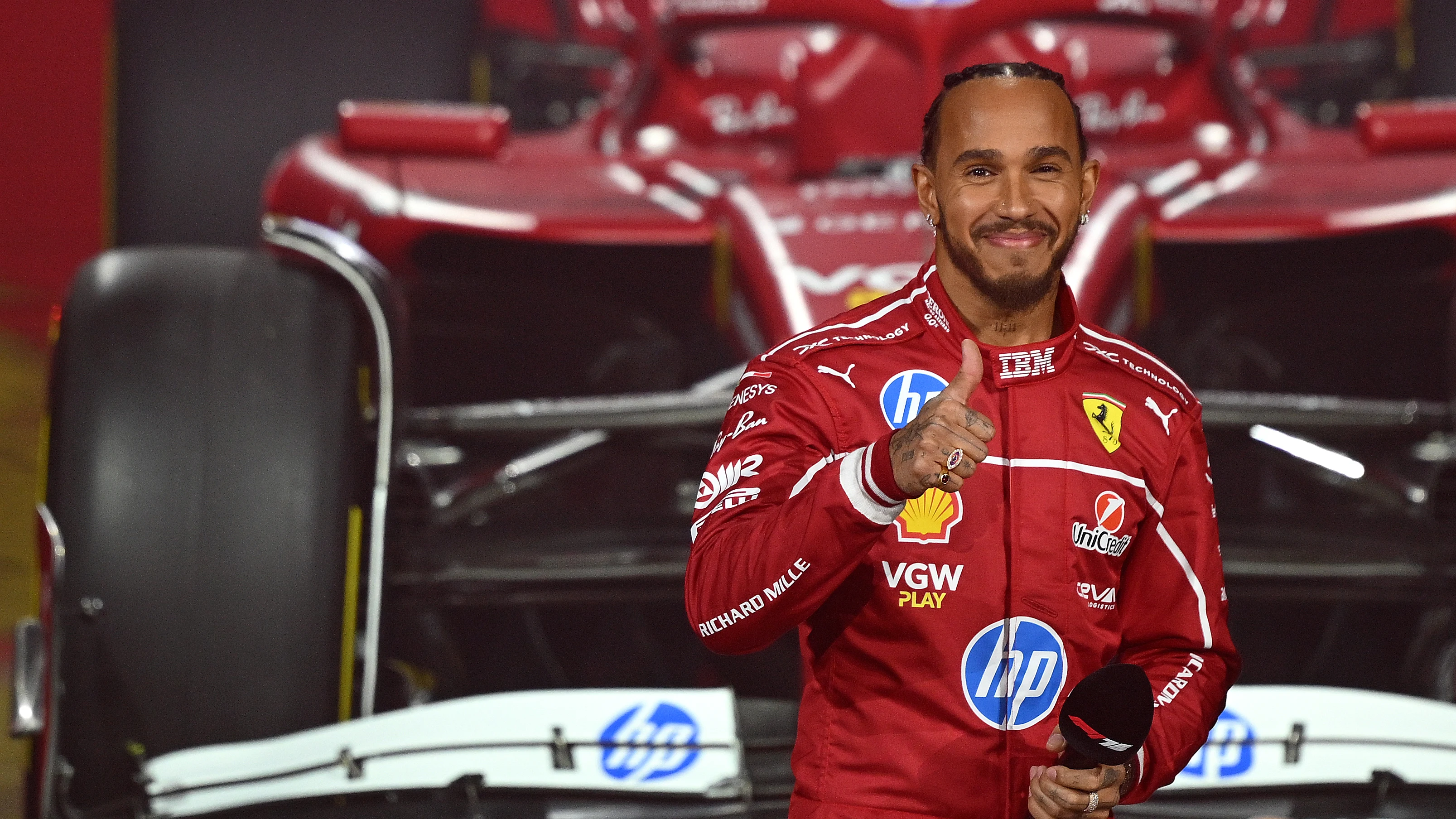 LONDON, ENGLAND - FEBRUARY 18: Lewis Hamilton of Great Britain and Scuderia Ferrari looks on during