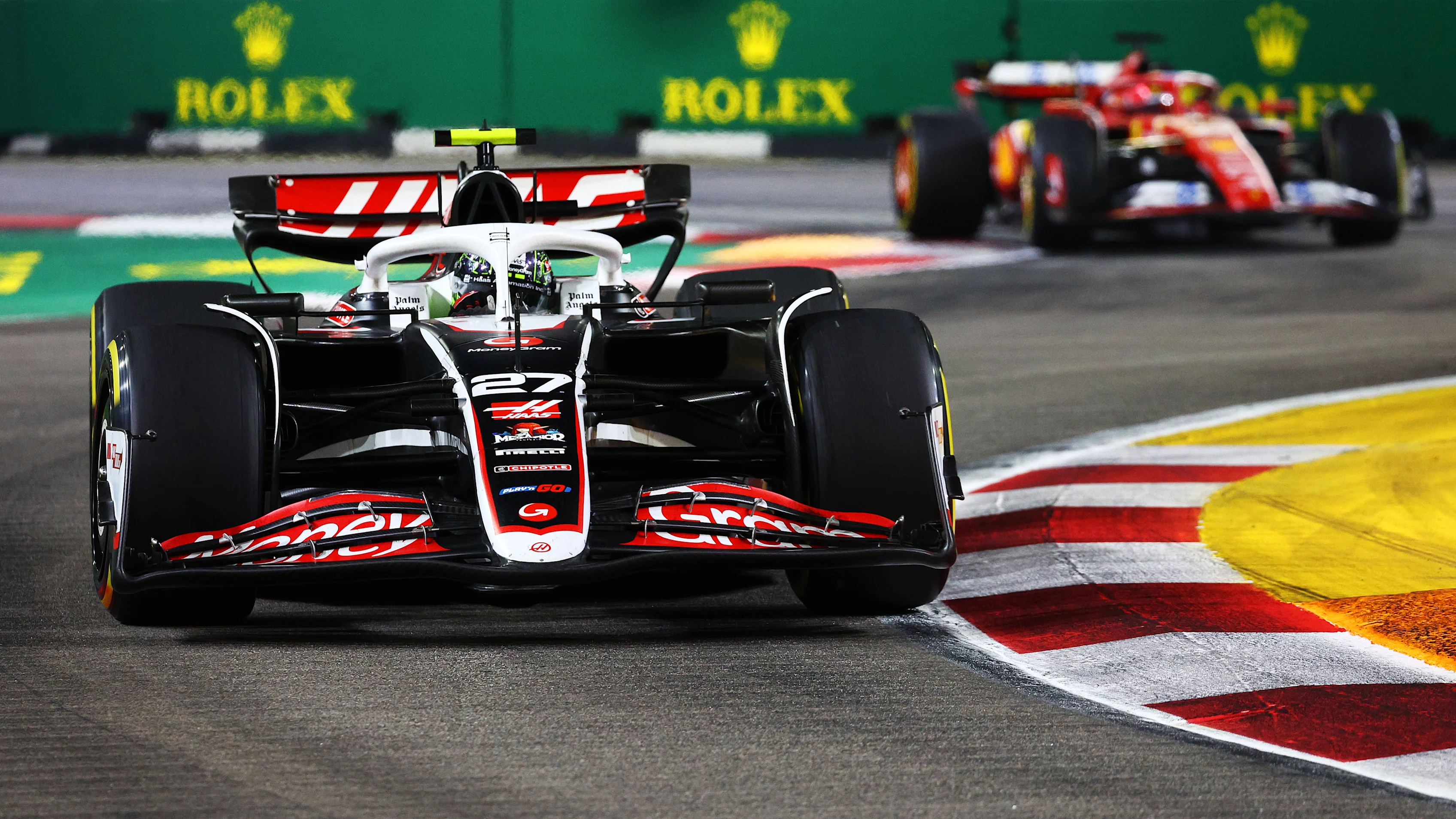 SINGAPORE, SINGAPORE - SEPTEMBER 22: Nico Hulkenberg of Germany driving the (27) Haas F1 VF-24