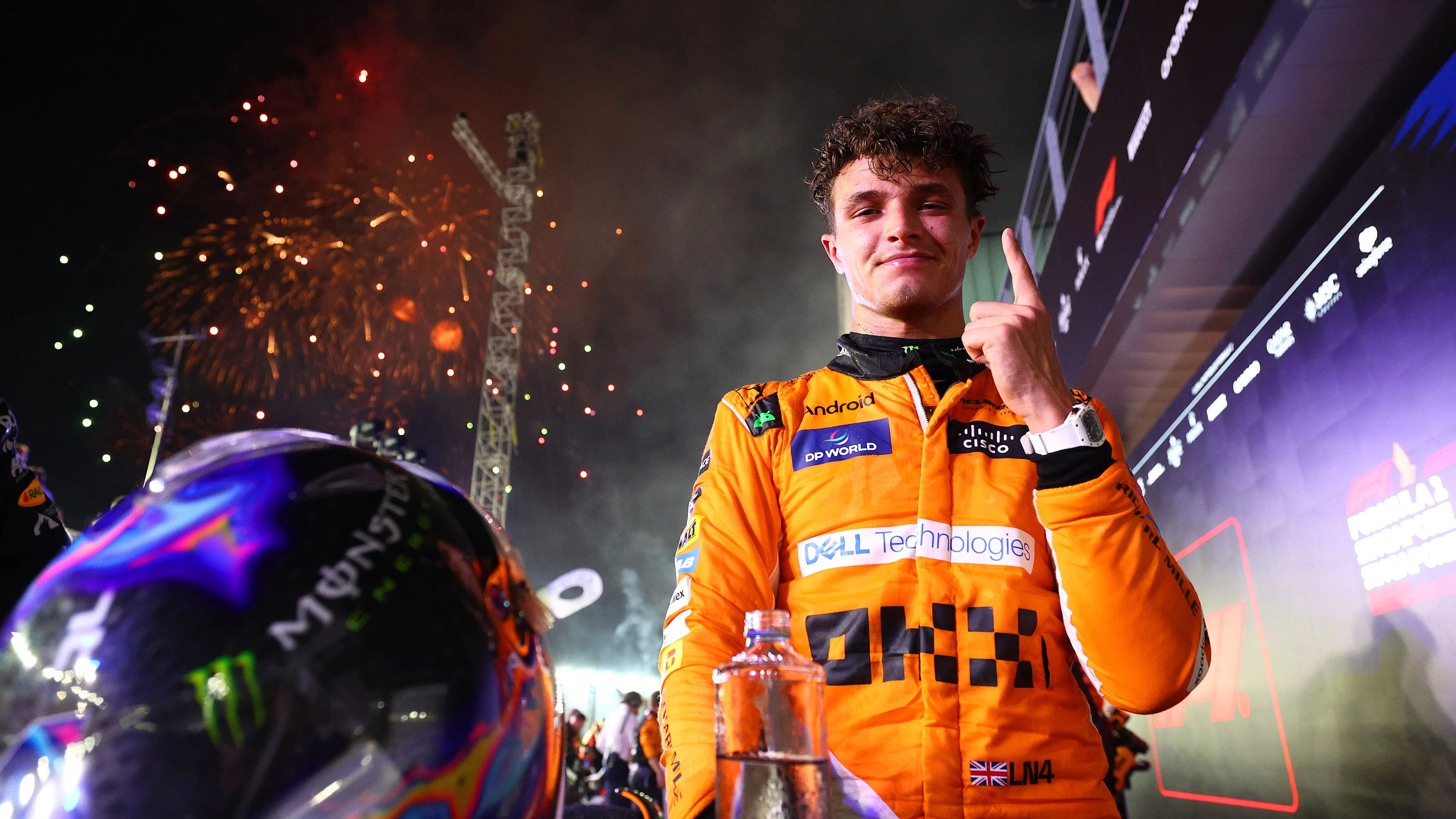 SINGAPORE, SINGAPORE - SEPTEMBER 22: Race winner Lando Norris of Great Britain and McLaren