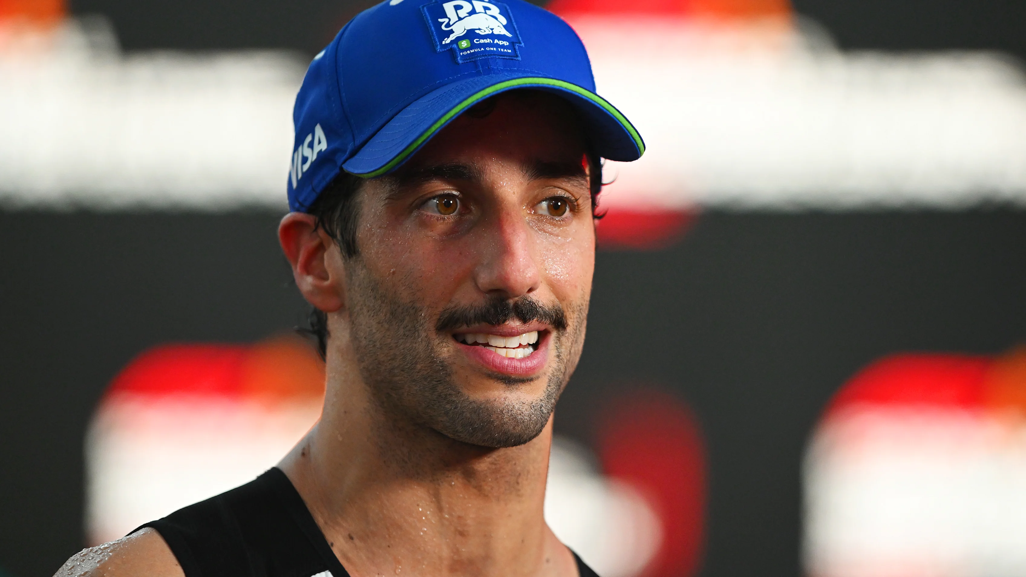 SINGAPORE, SINGAPORE - SEPTEMBER 22: 18th placed Daniel Ricciardo of Australia and Visa Cash App RB