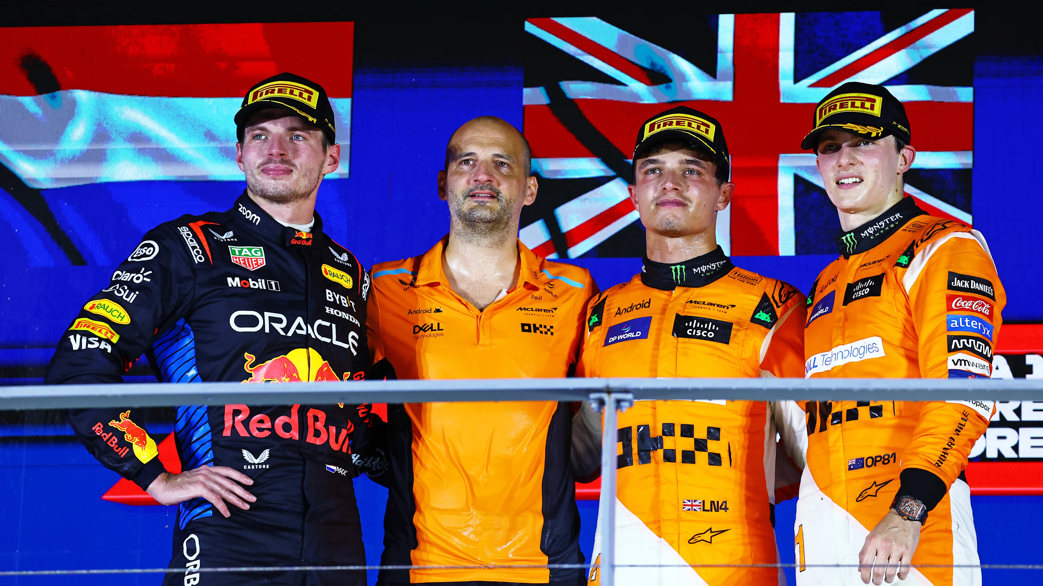 SINGAPORE, SINGAPORE - SEPTEMBER 22: Race winner Lando Norris of Great Britain and McLaren, Second