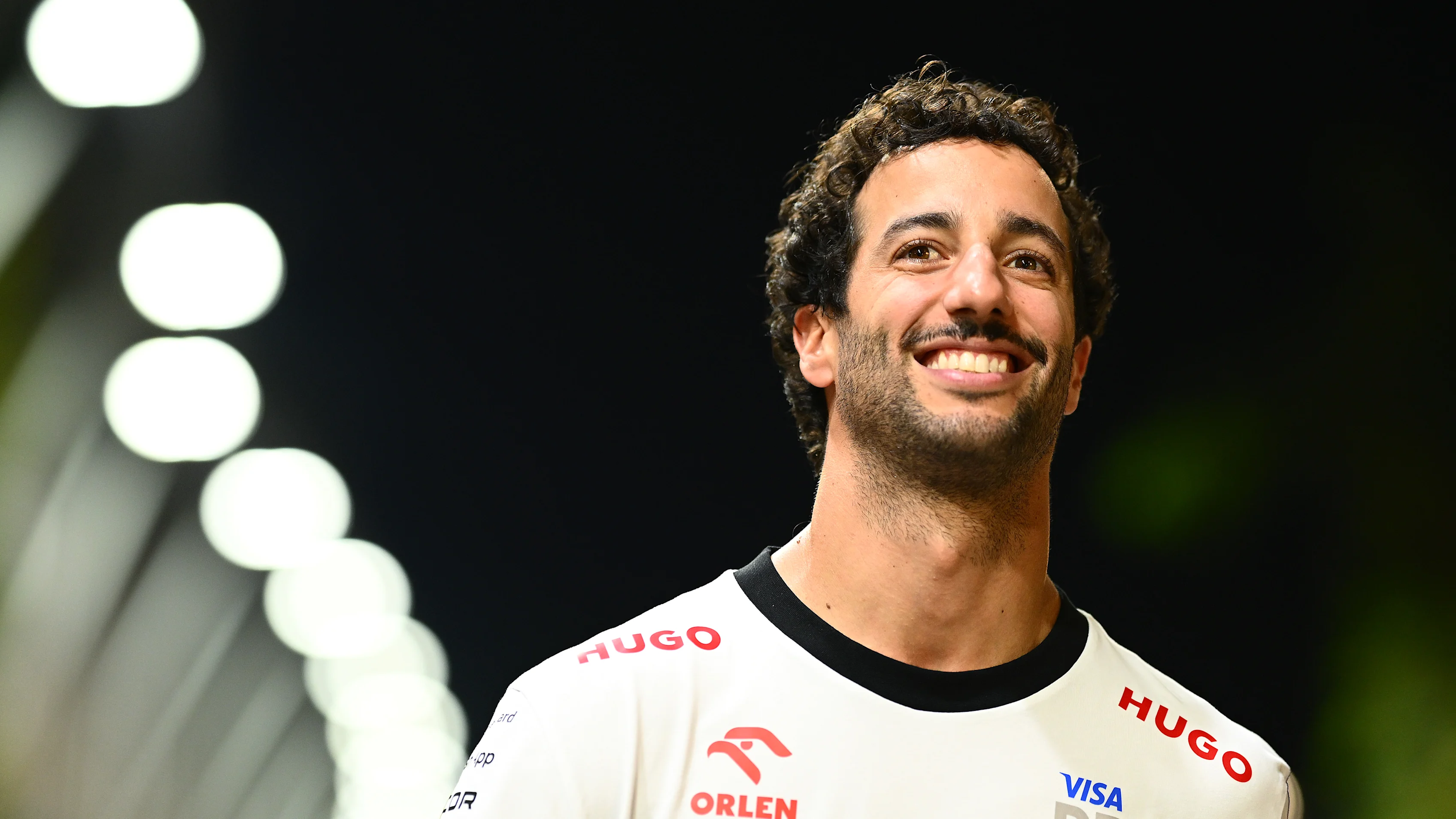 SINGAPORE, SINGAPORE - SEPTEMBER 19: Daniel Ricciardo of Australia and Visa Cash App RB walks in