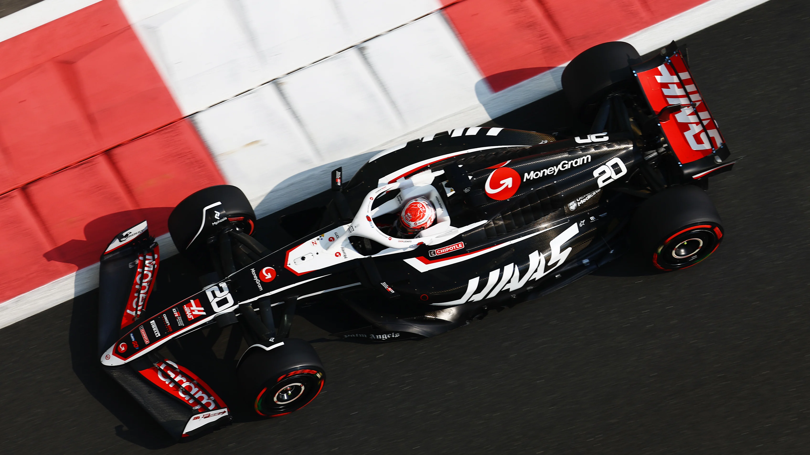 ABU DHABI, UNITED ARAB EMIRATES - DECEMBER 06: Kevin Magnussen of Denmark driving the (20) Haas F1
