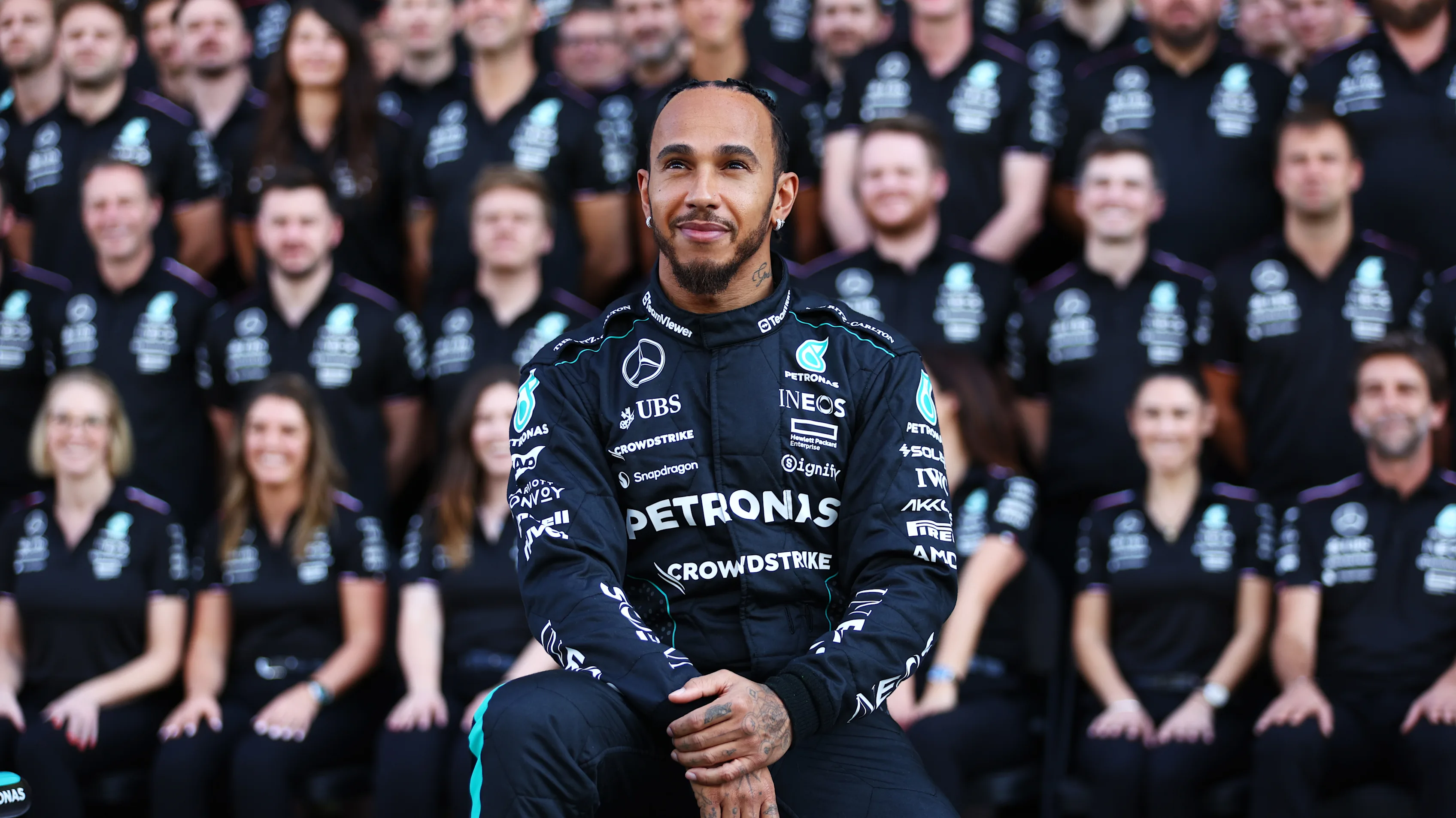 ABU DHABI, UNITED ARAB EMIRATES - DECEMBER 05: Lewis Hamilton of Great Britain and Mercedes looks