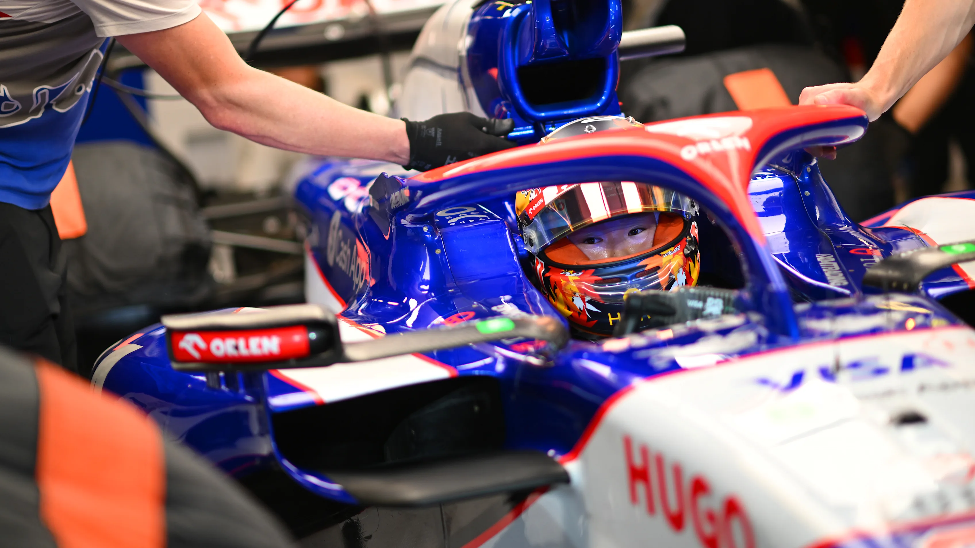 ABU DHABI, UNITED ARAB EMIRATES - DECEMBER 07: Yuki Tsunoda of Japan and Visa Cash App RB prepares